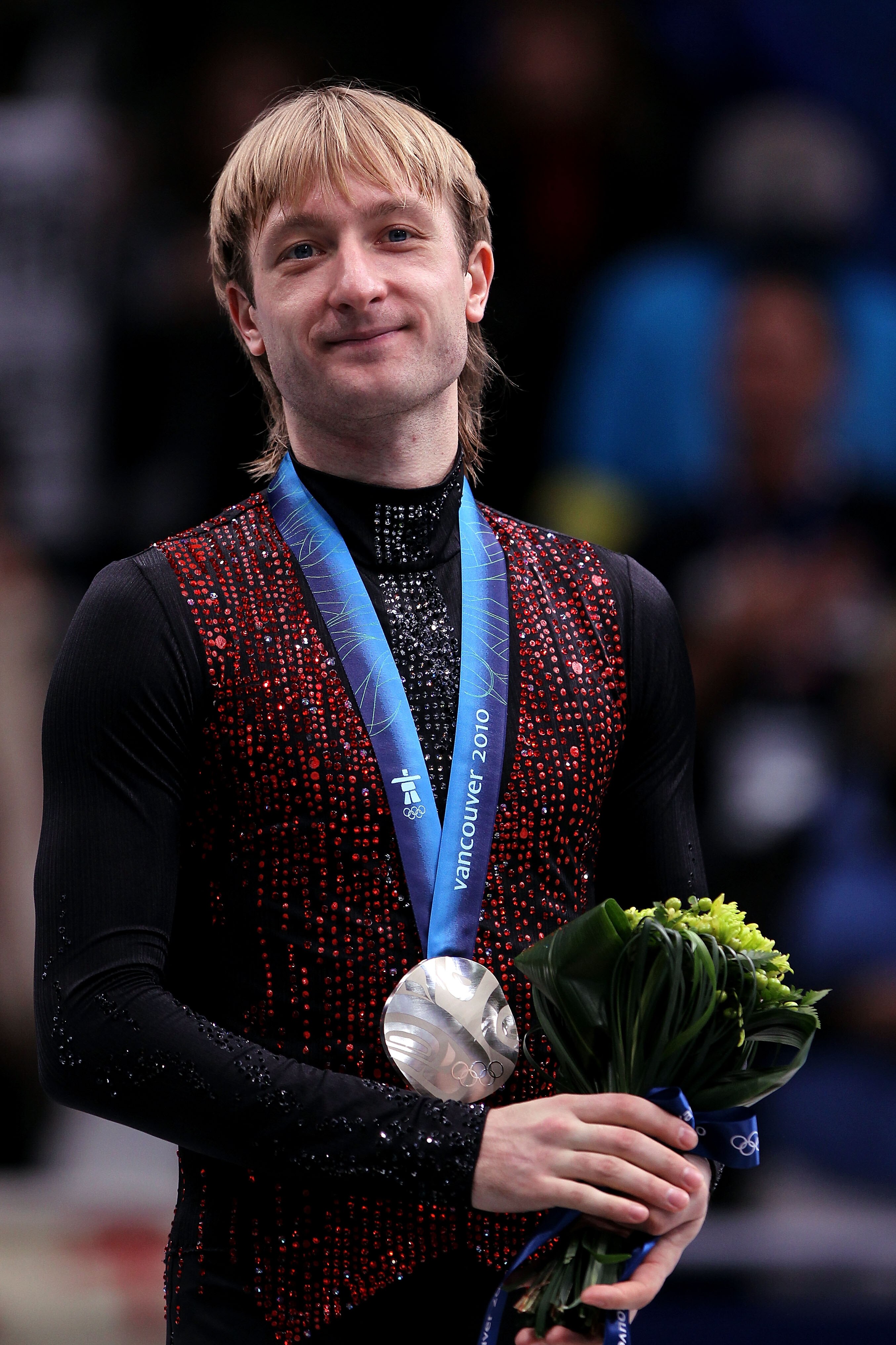 VANCOUVER, BC - FEBRUARY 18:  Silver medalist Evgeni Plushenko of Russia looks on in the men's figure skating free skating on day 7 of the Vancouver 2010 Winter Olympics at the Pacific Coliseum on February 18, 2010 in Vancouver, Canada.  (Photo by Matthew