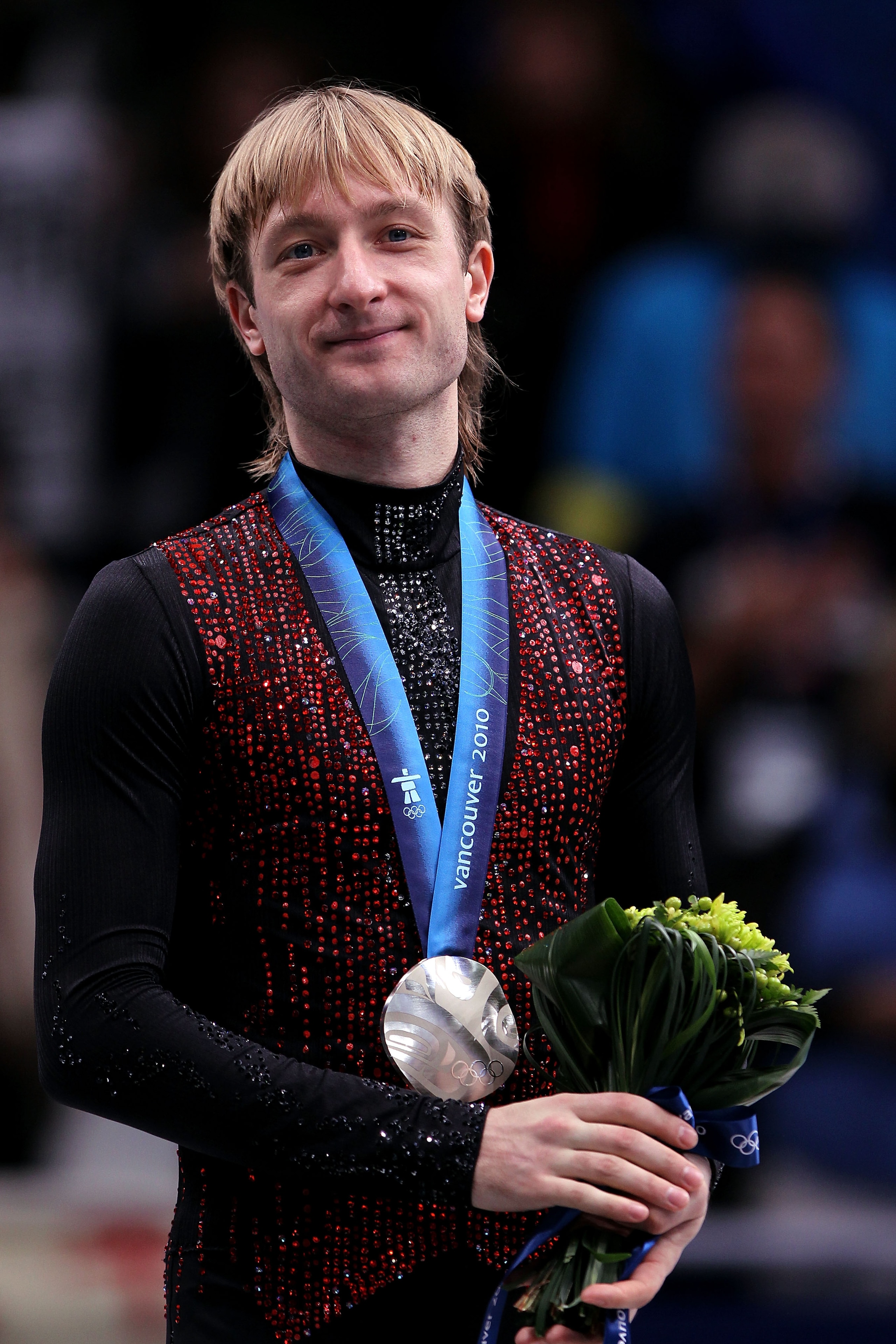 VANCOUVER, BC - FEBRUARY 18:  Silver medalist Evgeni Plushenko of Russia looks on in the men's figure skating free skating on day 7 of the Vancouver 2010 Winter Olympics at the Pacific Coliseum on February 18, 2010 in Vancouver, Canada.  (Photo by Matthew