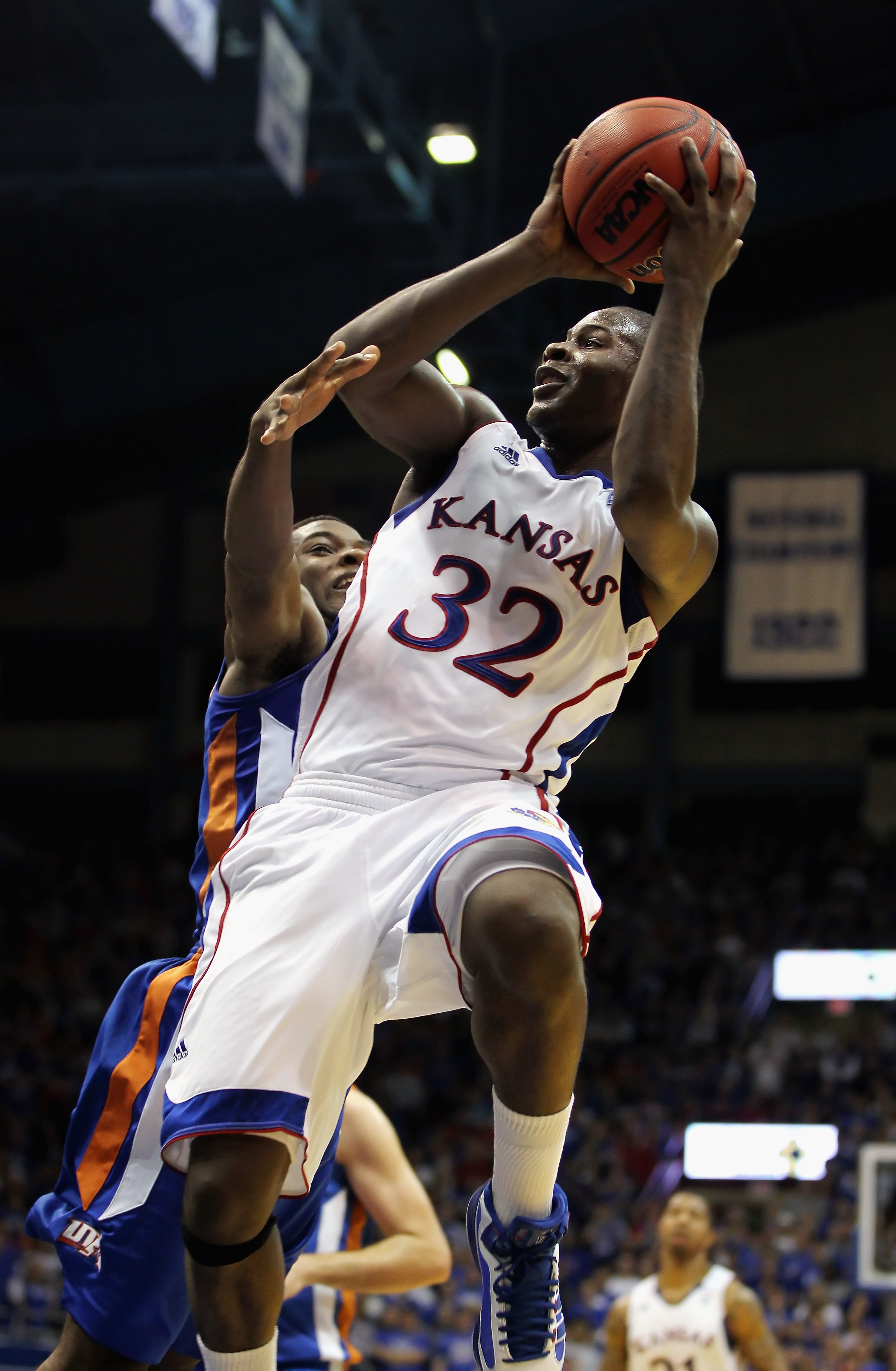 LAWRENCE, KS - DECEMBER 29:  Josh Selby #32 of the Kansas Jayhawks shoots during the game against the University of Texas Arlington Mavericks on December 29, 2010 at Allen Fieldhouse in Lawrence, Kansas.  (Photo by Jamie Squire/Getty Images)