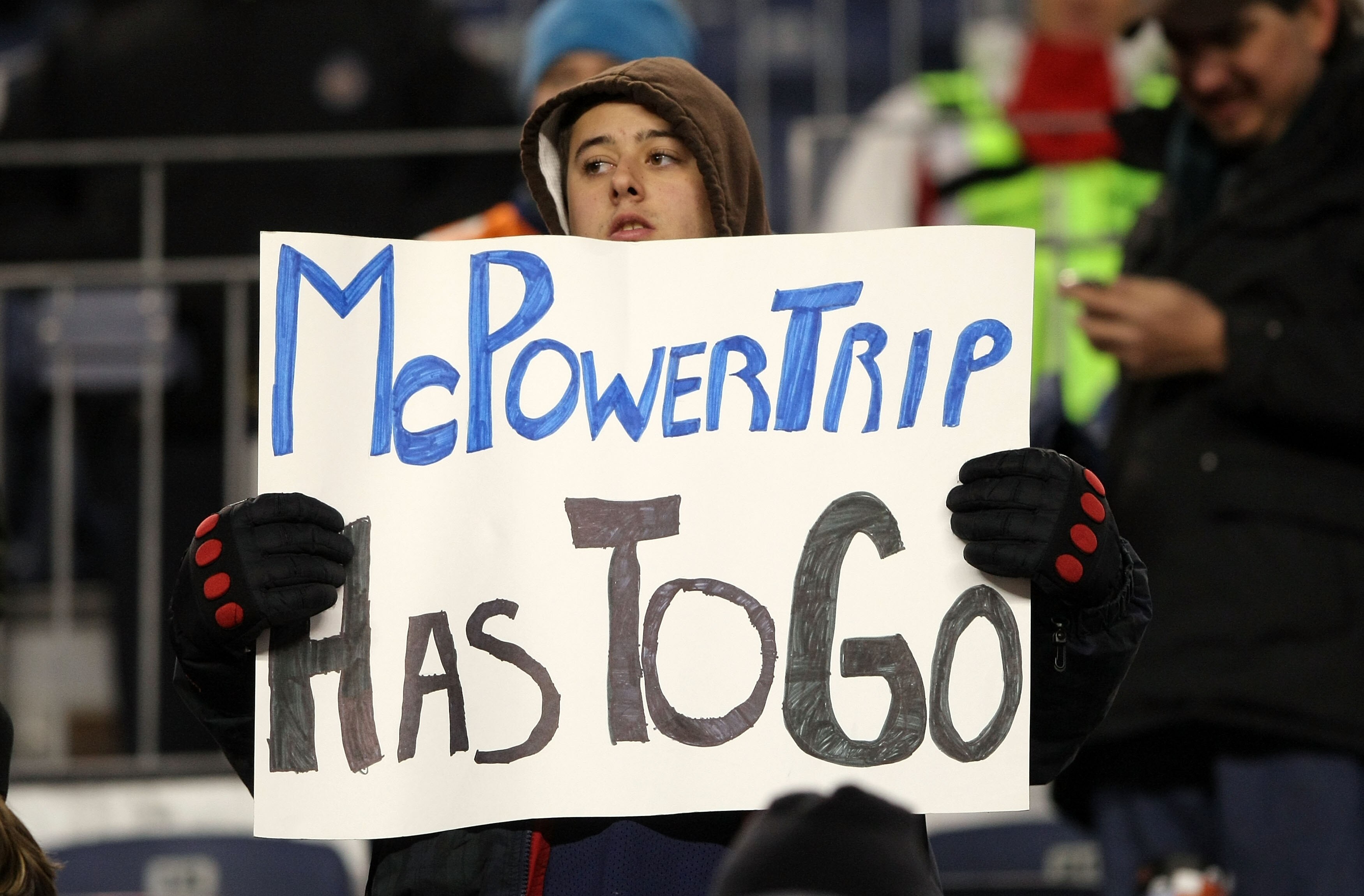 DENVER - JANUARY 03: A Broncos fan holds a sign expressing his sentiments about head coach Josh McDaniels of the Denver Broncos as the Broncos were defeated by the Kansas City Chiefs during NFL action at Invesco Field at Mile High on January 3, 2010 in De