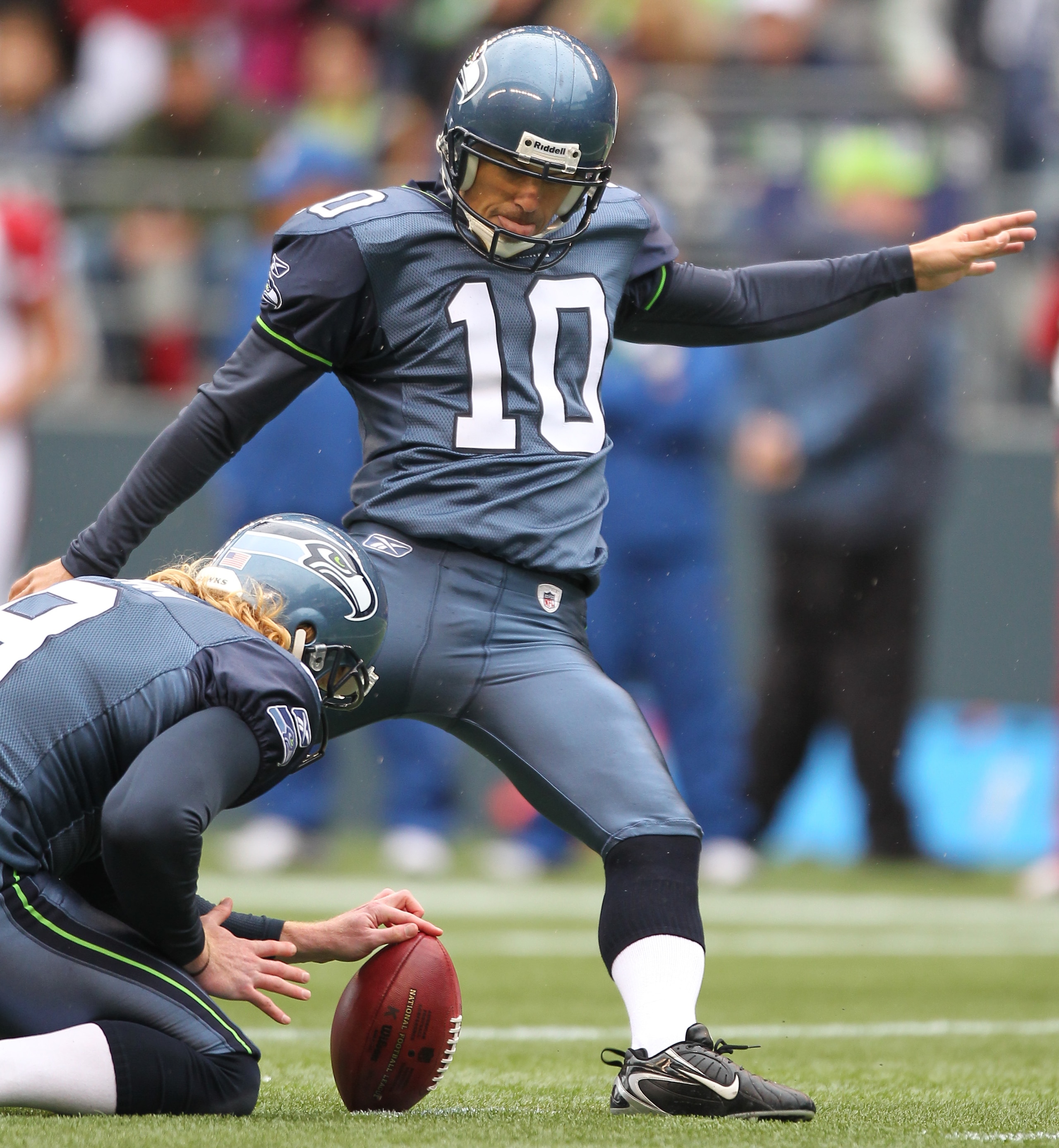 SEATTLE - OCTOBER 24:  Kicker Olindo Mare #10 of the Seattle Seahawks kicks a field goal against the Arizona Cardinals at Qwest Field on October 24, 2010 in Seattle, Washington. (Photo by Otto Greule Jr/Getty Images)