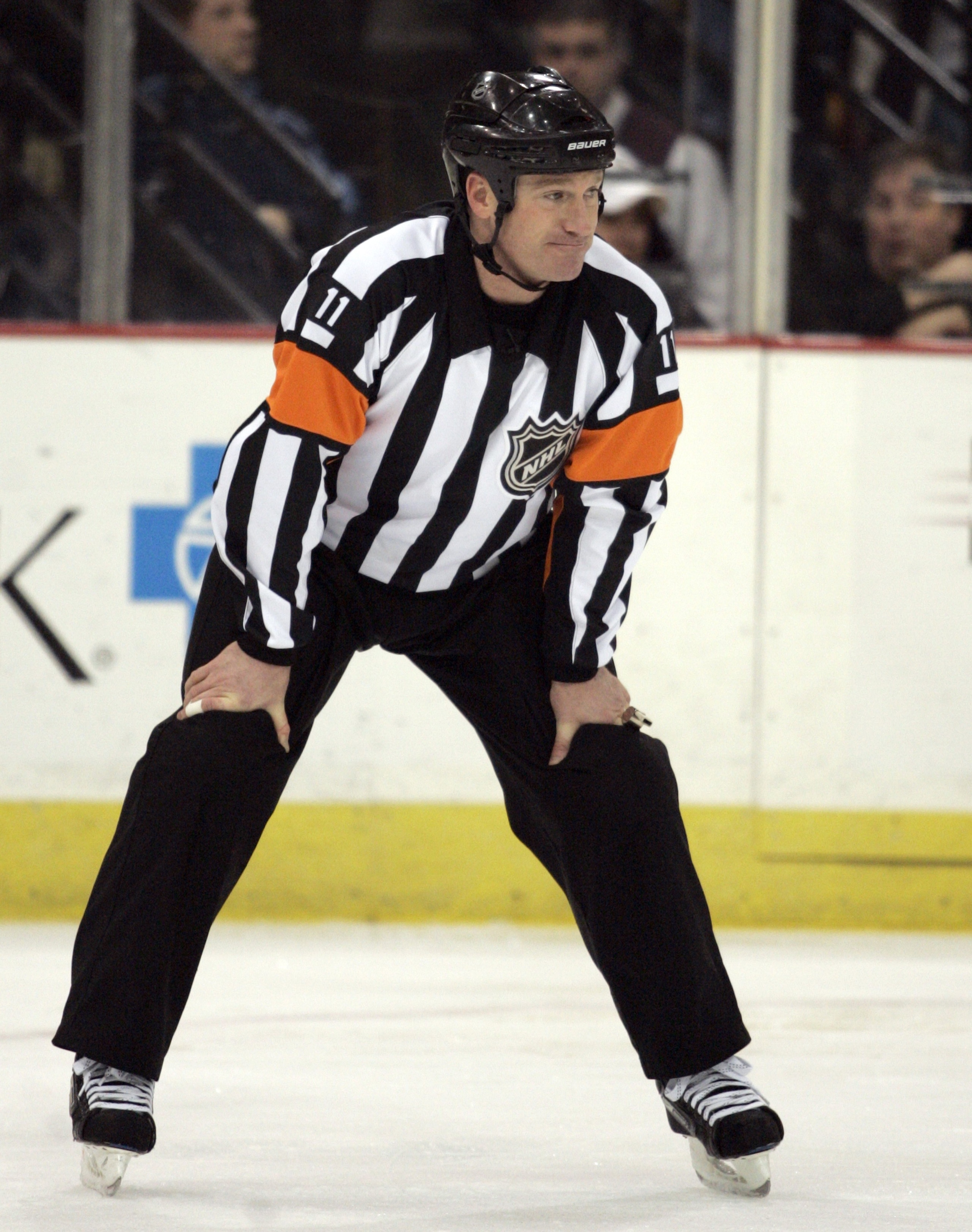 PITTSBURGH - FEBRUARY 14:  Referee Kelly Sutherland looks on during play between the Nashville Predators and the Pittsburgh Penguins at Mellon Arena on February 14, 2010 in Pittsburgh, Pennsylvania.  The Predators defeated the Penguins 4-3 in shootout ove