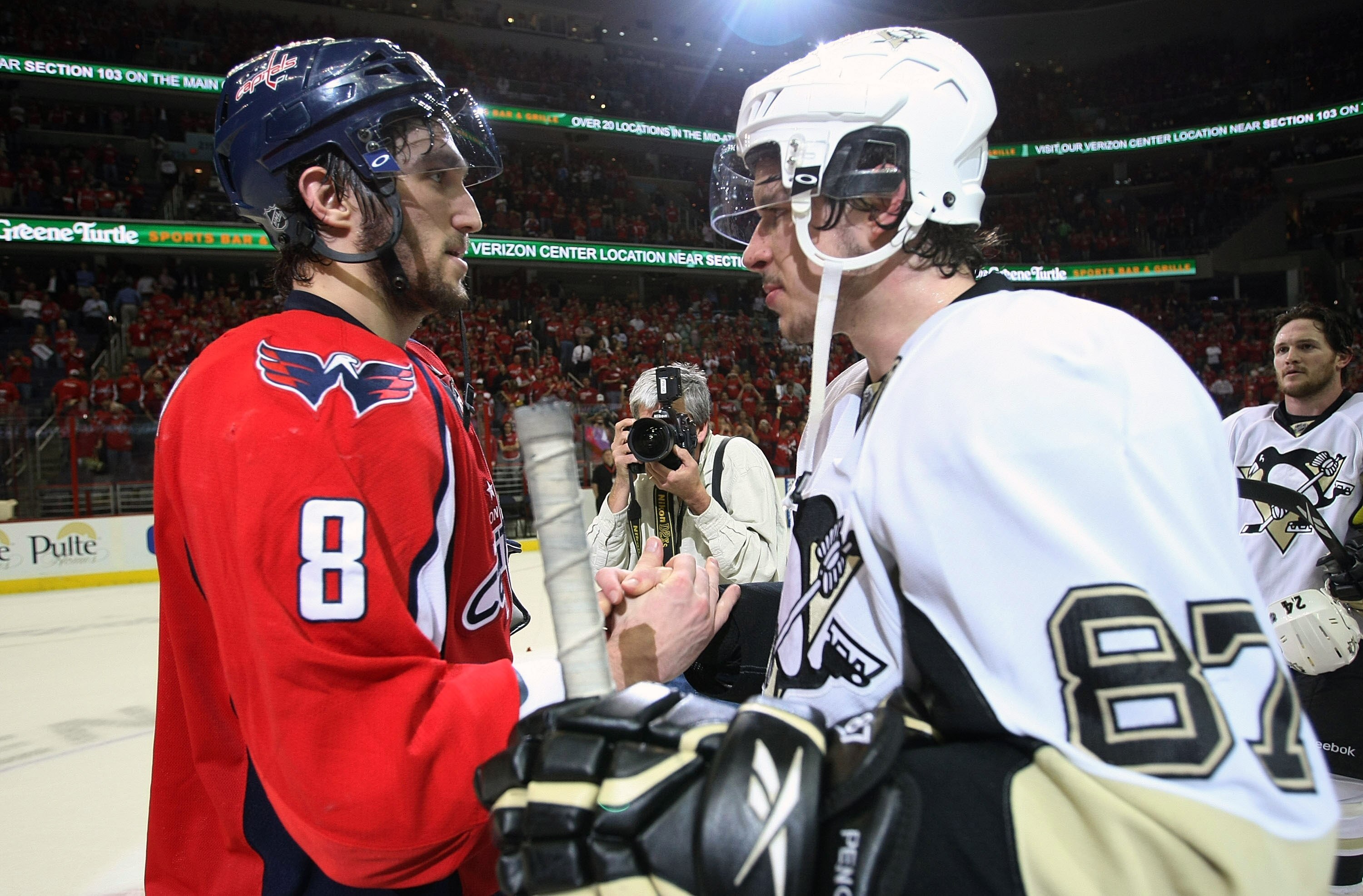 WASHINGTON - MAY 13: Alex Ovechkin #8 of the Washington Capitals and Sidney Crosby #87 of the Pittsburgh Penguins shake hands after Pittsburgh's 6-2 victory in Game Seven of the Eastern Conference Semifinal Round of the 2009 Stanley Cup Playoffs at Verizo