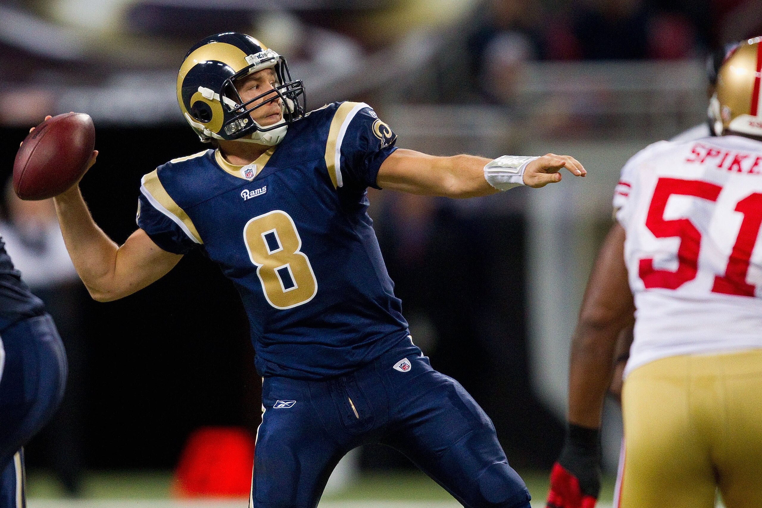 ST. LOUIS, MO - DECEMBER 26: Sam Bradford #8 of the St. Louis Rams passes against the San Francisco 49ers at the Edward Jones Dome on December 26, 2010 in St. Louis, Missouri. The Rams beat the 49ers 25-17. (Photo by Dilip Vishwanat/Getty Images)