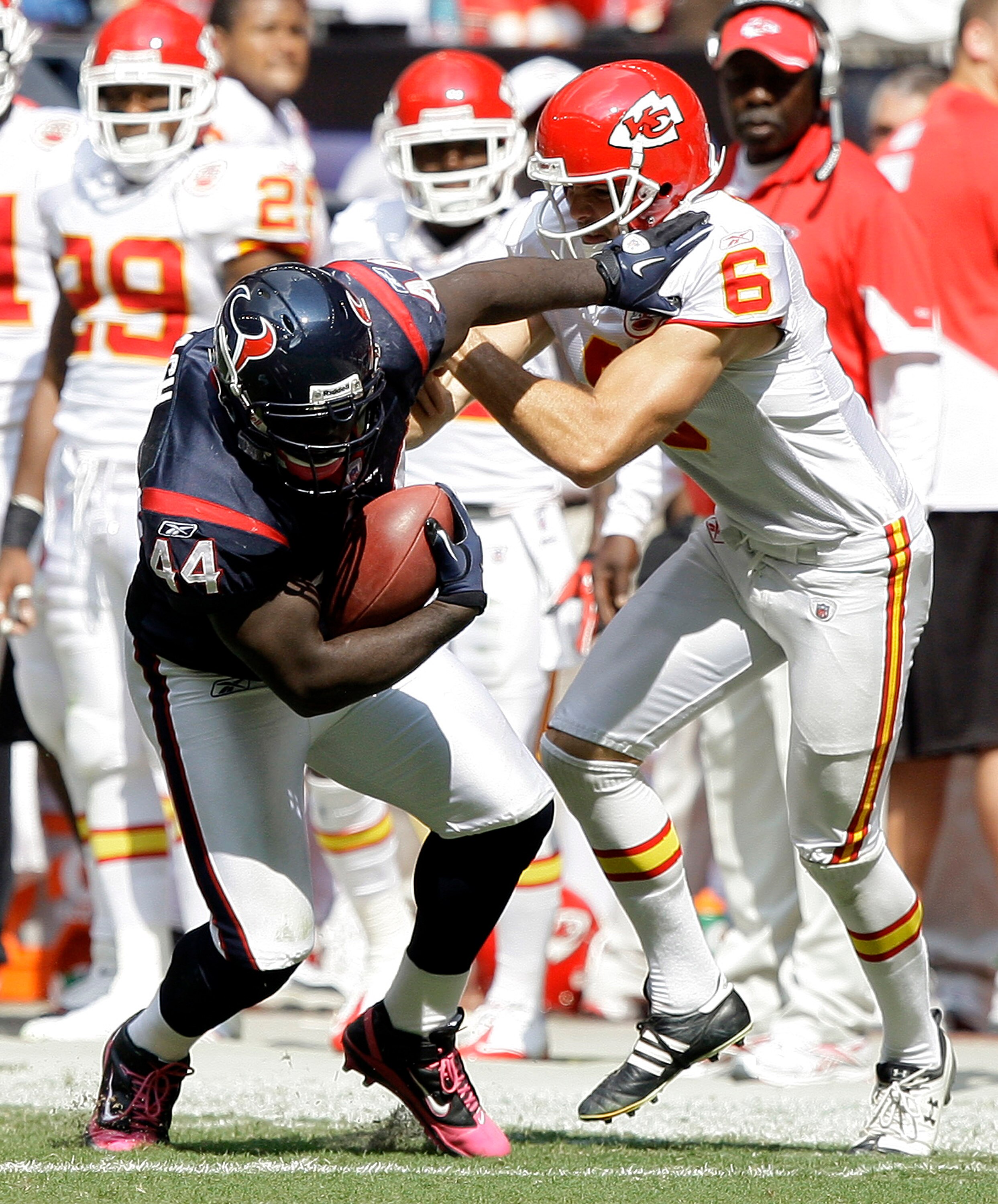 HOUSTON - OCTOBER 17:  Vonta Leach #44 of the Houston Texans runs over kicker Ryan Succop #6 of the Kansas City Chiefs at Reliant Stadium on October 17, 2010 in Houston, Texas.  (Photo by Bob Levey/Getty Images)