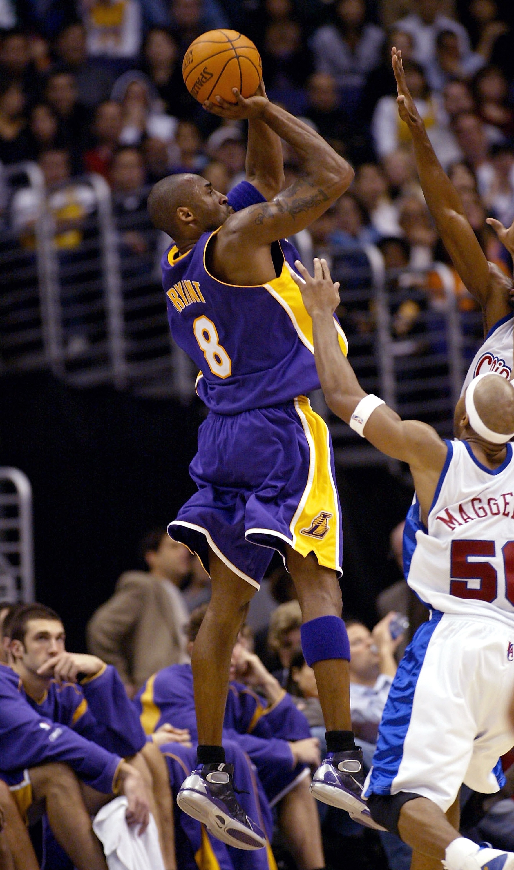 LOS ANGELES - DECEMBER 11:  Kobe Bryant #8 of the Los Angeles Lakers shoots a jump shot against the Los Angeles Clippers on December 11, 2004 at Staples Center in Los Angeles, California. The Lakers won 89-87.  NOTE TO USER: User expressly acknowledges an