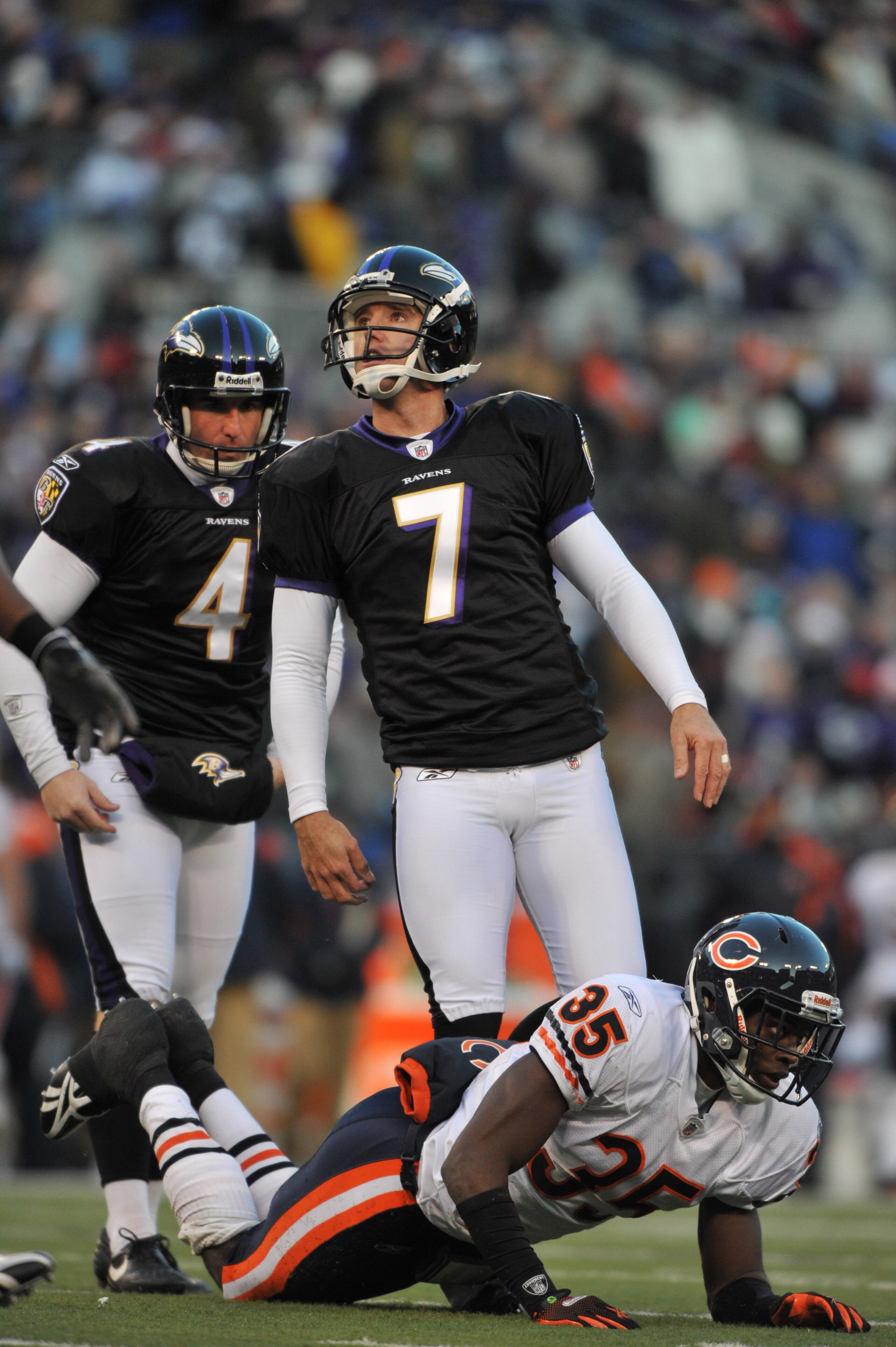 BALTIMORE - DECEMBER 20:  Billy Cundiff #7 of the Baltimore Ravens watches his kick against the Chicago Bears at M&T Bank Stadium on December 20, 2009 in Baltimore, Maryland. The Ravens defeated the Bears 31-7. (Photo by Larry French/Getty Images)