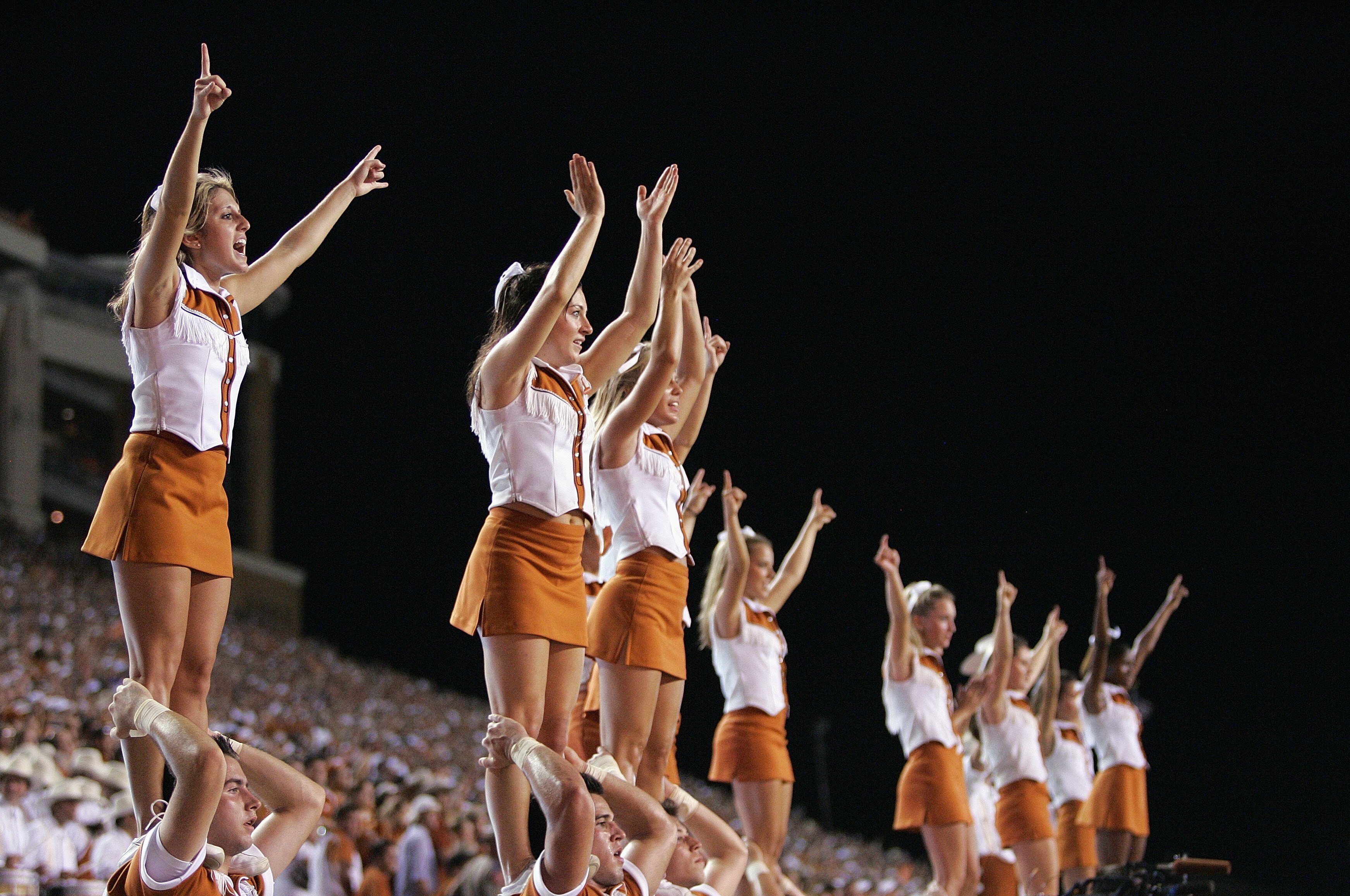 AUSTIN, TX - SEPTEMBER 8:  Texas Longhorns cheerleaders cheer on during the game against the TCU Horned Frogs on September 8, 2007 at Darren K. Royal Stadium in Austin, Texas.  Texas won 34-13.  (Photo by Brian Bahr/Getty Images)