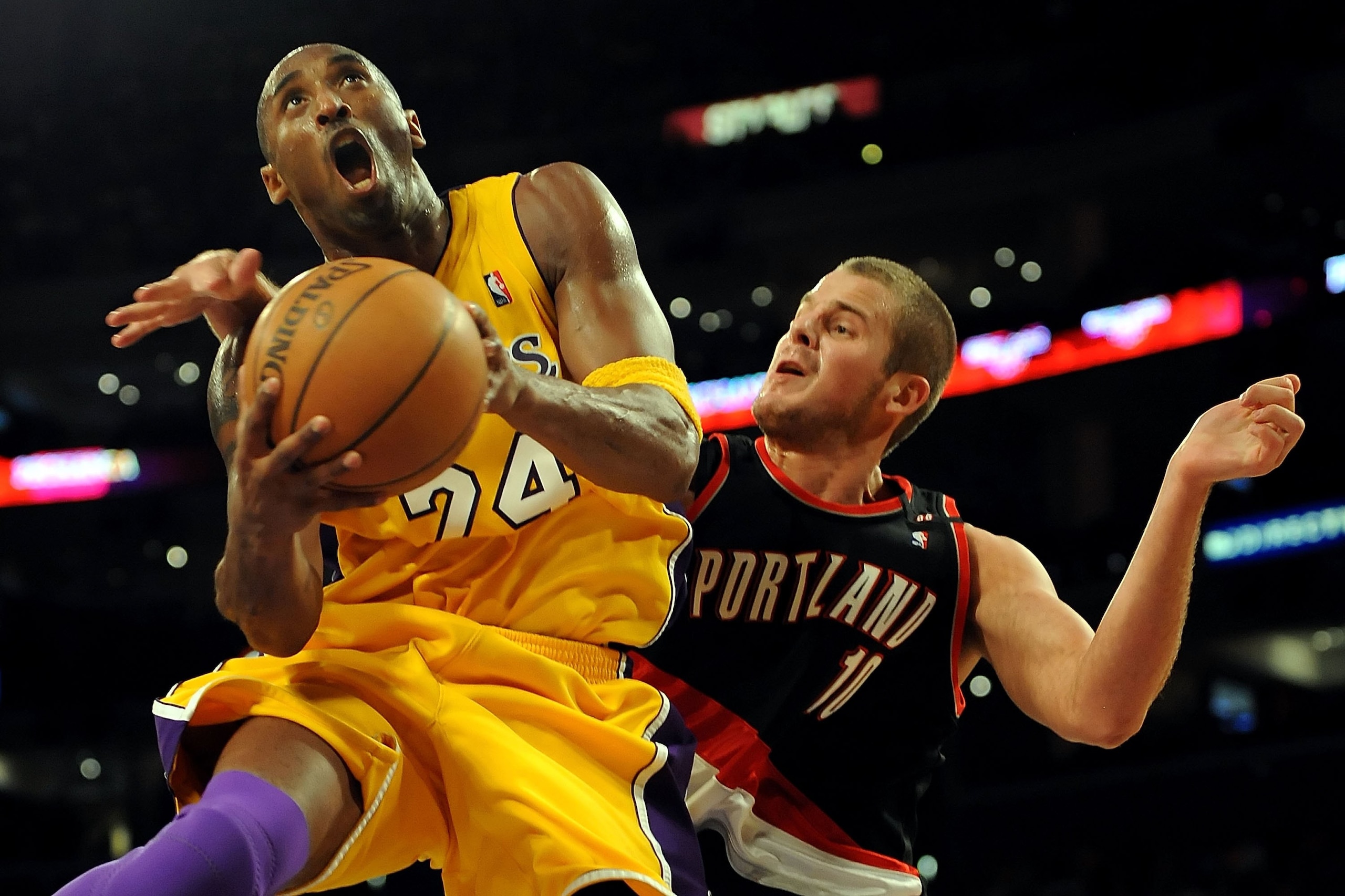 LOS ANGELES, CA - OCTOBER 28:  Kobe Bryant #24 of the Los Angeles Lakers goes up for a shot against Joel Przybilla #10 of the Portland Trail Blazers in the third quarter on October 28, 2008 at Staples Center in Los Angeles, California. NOTE TO USER: User