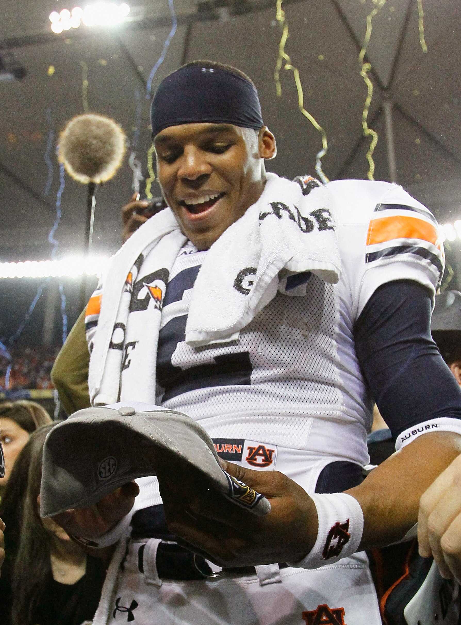 ATLANTA, GA - DECEMBER 04:  Quarterback Cam Newton #2 of the Auburn Tigers celebrates after their 56-17 win over the South Carolina Gamecocks during the 2010 SEC Championship at Georgia Dome on December 4, 2010 in Atlanta, Georgia.  (Photo by Kevin C. Cox