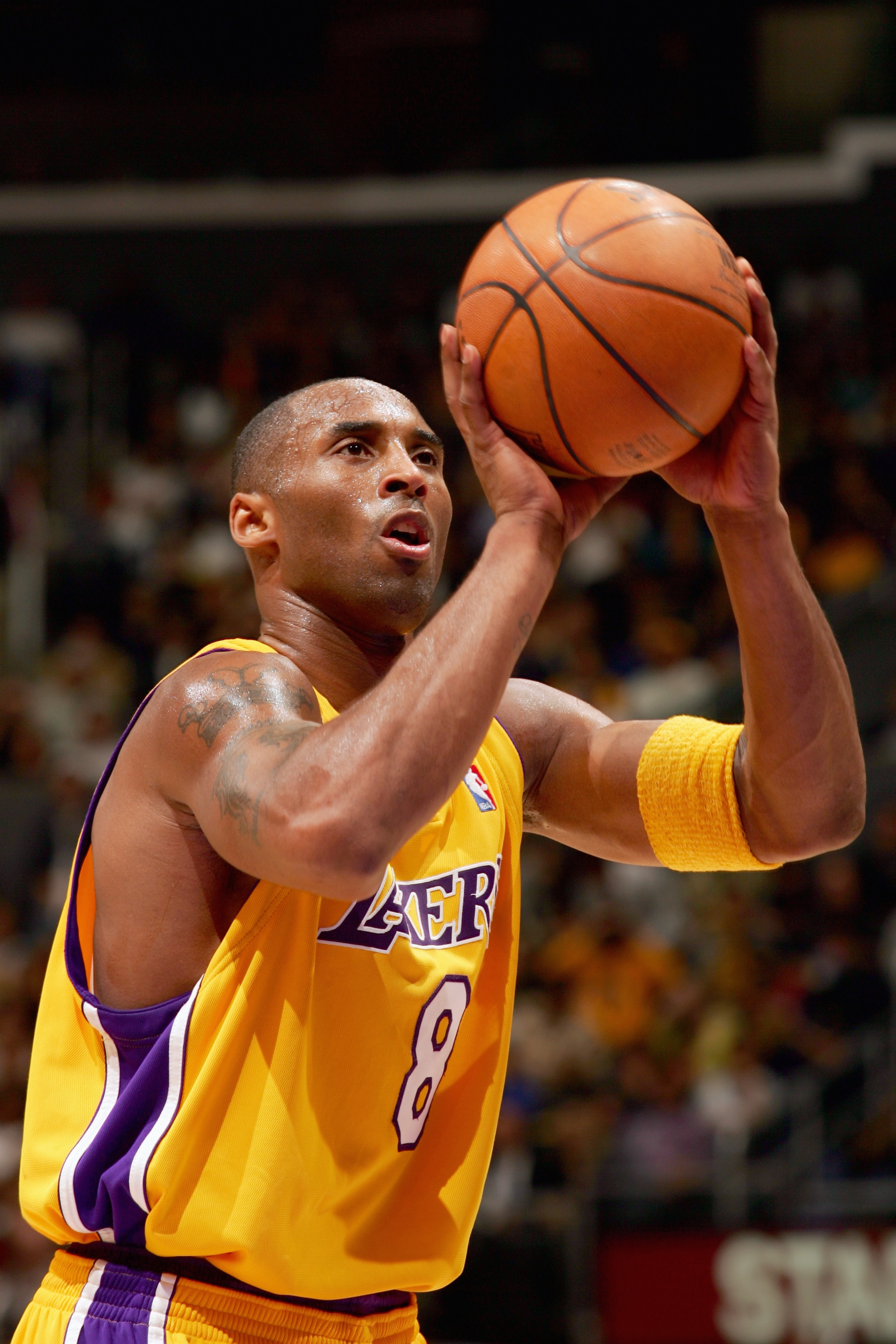 LOS ANGELES - DECEMBER 20:  Kobe Bryant #8 of the Los Angeles Lakers prepares to shoot a free throw during a game against the Dallas Mavericks at Staples Center on December 20, 2005 in Los Angeles, California. The Lakers 112-90 in which Kobe Bryant scores