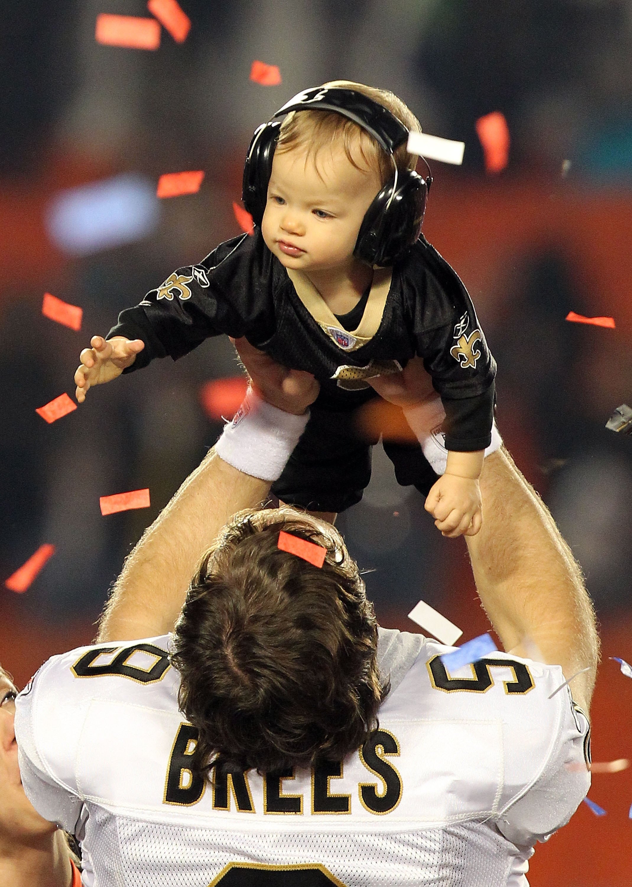 MIAMI GARDENS, FL - FEBRUARY 07:  Drew Brees #9 of the New Orleans Saints celebrates with his son Baylen Brees after defeating the Indianapolis Colts during Super Bowl XLIV on February 7, 2010 at Sun Life Stadium in Miami Gardens, Florida.  (Photo by Rona