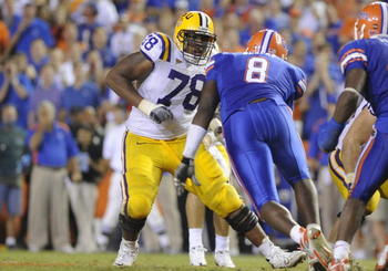LSU offensive tackle Joseph Barksdale in action against former Florida Gator Carlos Dunlap