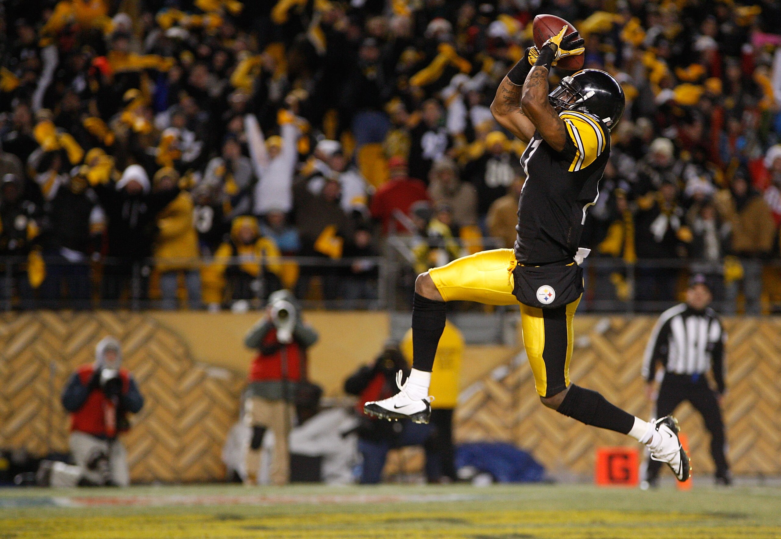PITTSBURGH - DECEMBER 23: Mike Wallace #17 of the Pittsburgh Steelers celebrates after scoring a touchdown against the Carolina Panthers during the game on December 23, 2010 at Heinz Field in Pittsburgh, Pennsylvania. (Photo by Jared Wickerham/Getty Ima PITTSBURGH - DECEMBER 23: Mike Wallace #17 of the Pittsburgh Steelers celebrates after scoring a touchdown against the Carolina Panthers during the game on December 23, 2010 at Heinz Field in Pittsburgh, Pennsylvania. (Photo by Jared Wickerham/Getty Ima