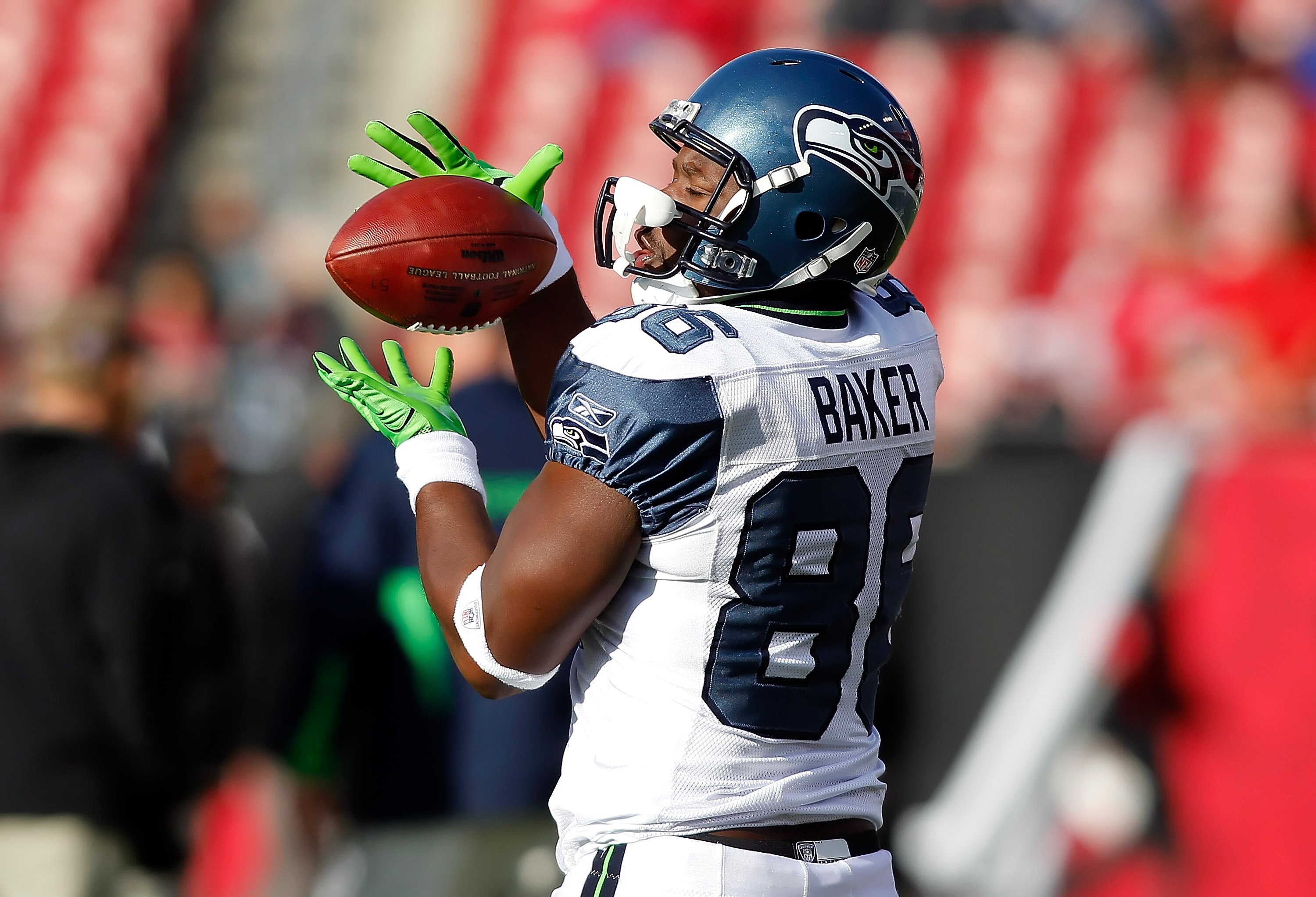 TAMPA, FL - DECEMBER 26:  Tight end Chris Baker #86 of the Seattle Seahawks catches a pass while warming up just before the start of the game against the Tampa Bay Buccaneers at Raymond James Stadium on December 26, 2010 in Tampa, Florida.  (Photo by J. M