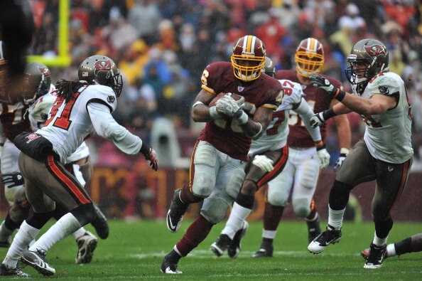 LANDOVER, MD - DECEMBER 12:  Ryan Torain #46 of the Washington Redskins runs the ball against the Tampa Bay Buccaneers  at FedExField on December 12, 2010 in Landover, Maryland. The Buccaneers defeated the Redskins 17-16. (Photo by Larry French/Getty Imag