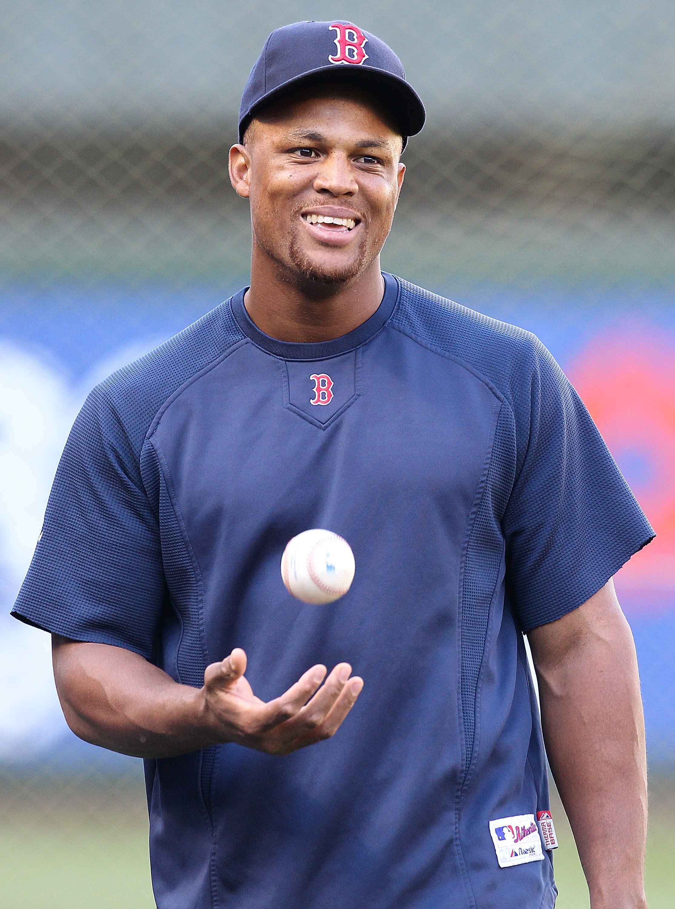 SEATTLE - SEPTEMBER 13:  Adrian Beltre #29 of the Boston Red Sox tosses the baseball during batting practice prior to the game against the Seattle Mariners at Safeco Field on September 13, 2010 in Seattle, Washington. (Photo by Otto Greule Jr/Getty Images