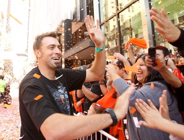 SAN FRANCISCO - NOVEMBER 03:  Jeremy Affeldt of the San Francisco Giants high fives fans during the San Francisco Giants victory parade on November 3, 2010 in San Francisco, California.  (Photo by Ezra Shaw/Getty Images)