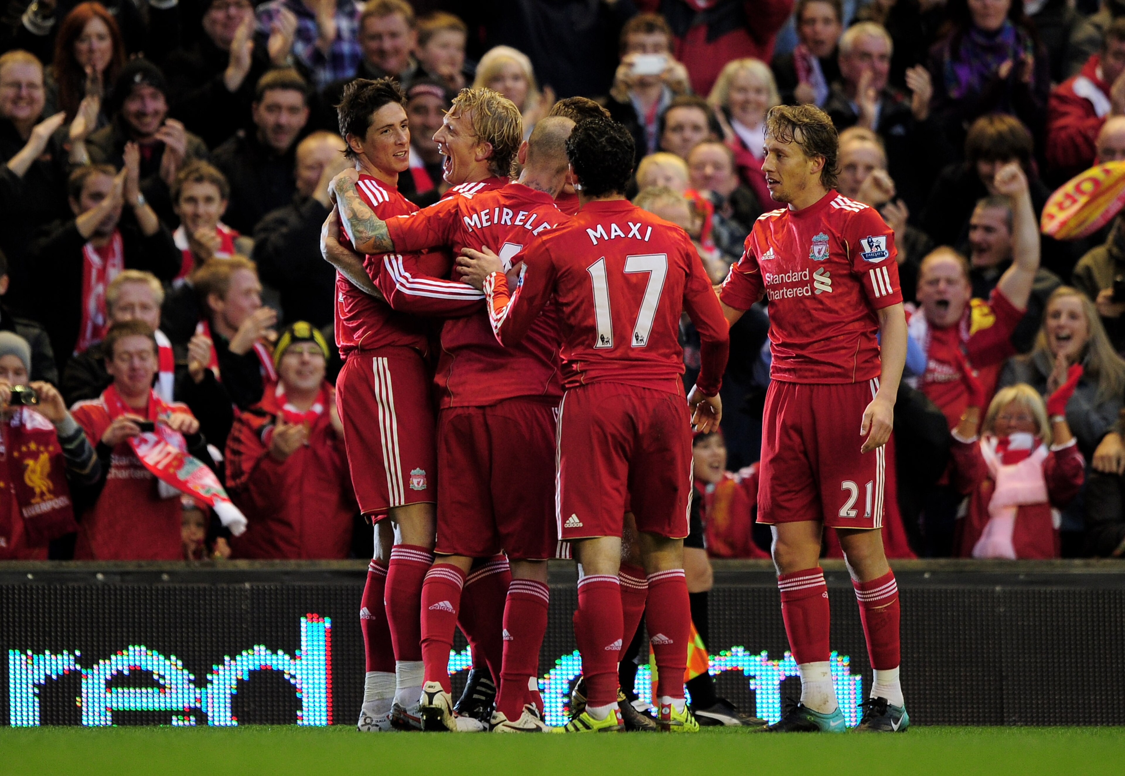 LIVERPOOL, ENGLAND - NOVEMBER 07: Fernando Torres (L) of Liverpool is congratulated by his team mates after scoring the opening goal during the Barclays Premier League match between Liverpool and Chelsea at Anfield on November 7, 2010 in Liverpool, Engl LIVERPOOL, ENGLAND - NOVEMBER 07: Fernando Torres (L) of Liverpool is congratulated by his team mates after scoring the opening goal during the Barclays Premier League match between Liverpool and Chelsea at Anfield on November 7, 2010 in Liverpool, Engl