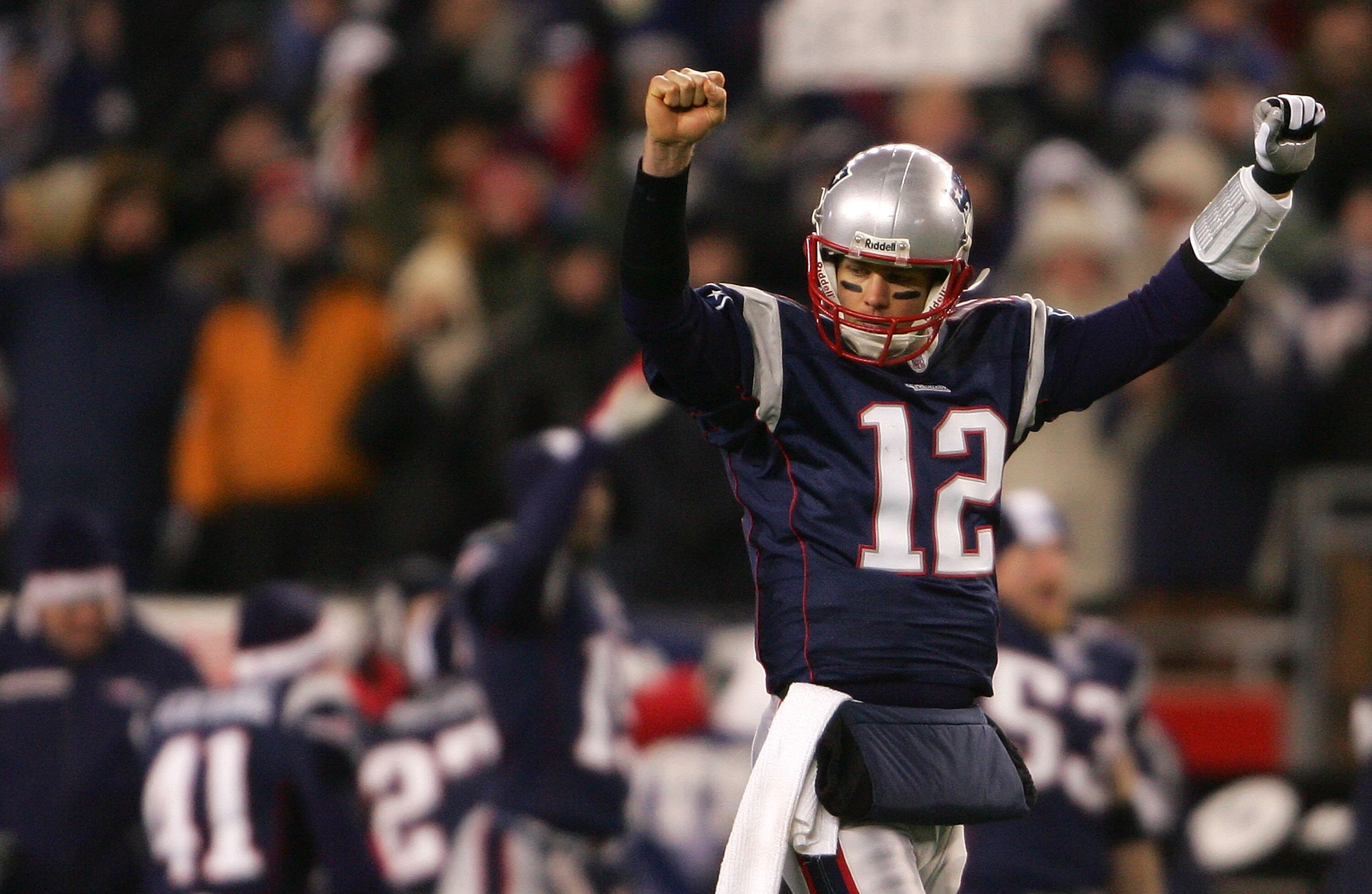 FOXBORO, MA - JANUARY 20:  Tom Brady #12 of the New England Patriots celebrates the Patriots 21-12 win against the San Diego Chargers during the AFC Championship Game on January 20, 2008 at Gillette Stadium in Foxboro, Massachusetts.  (Photo by Chris McGr