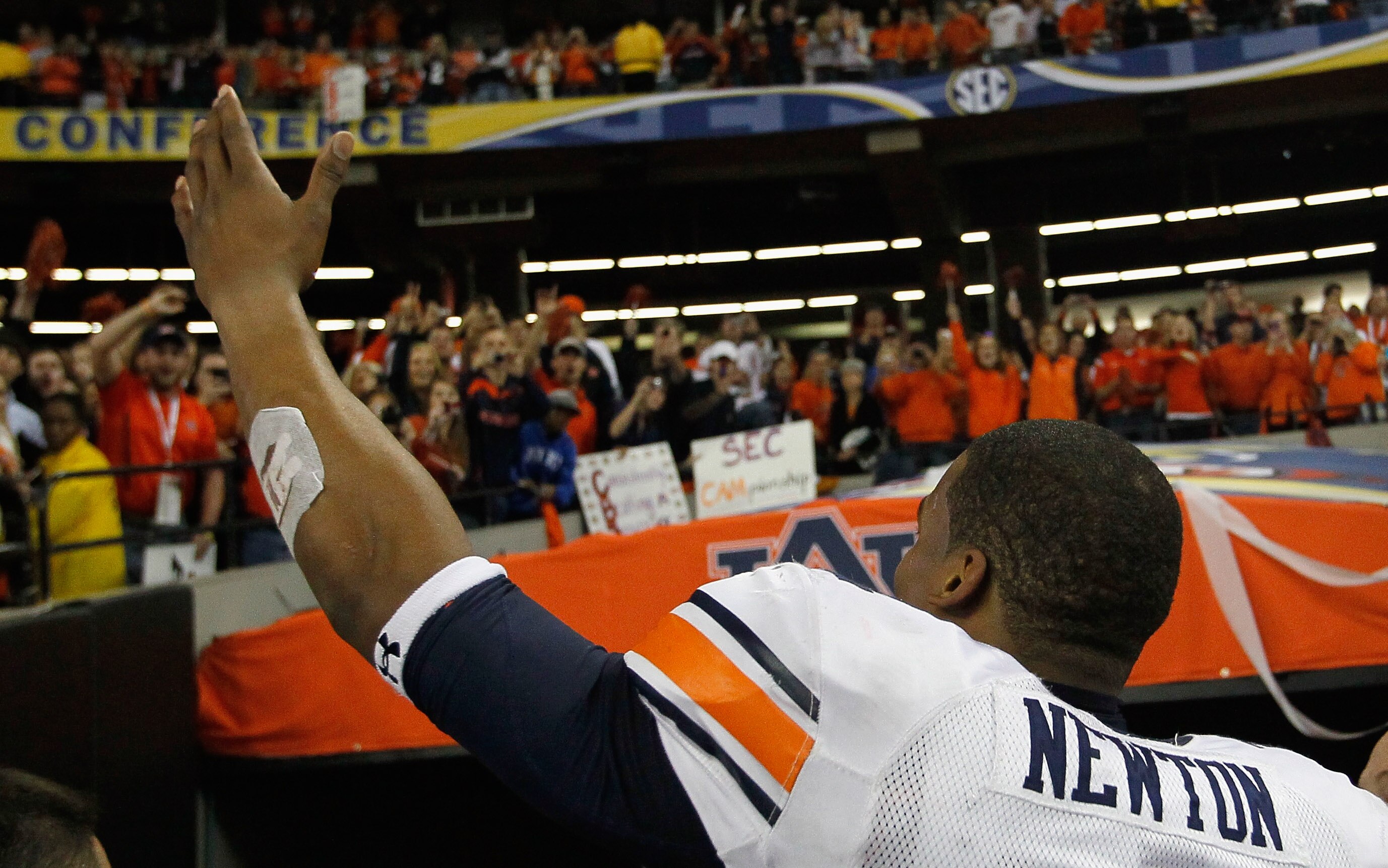 ATLANTA, GA - DECEMBER 04:  Quarterback Cam Newton #2 of the Auburn Tigers celebrates after their 56-17 win over the South Carolina Gamecocks during the 2010 SEC Championship at Georgia Dome on December 4, 2010 in Atlanta, Georgia.  (Photo by Kevin C. Cox