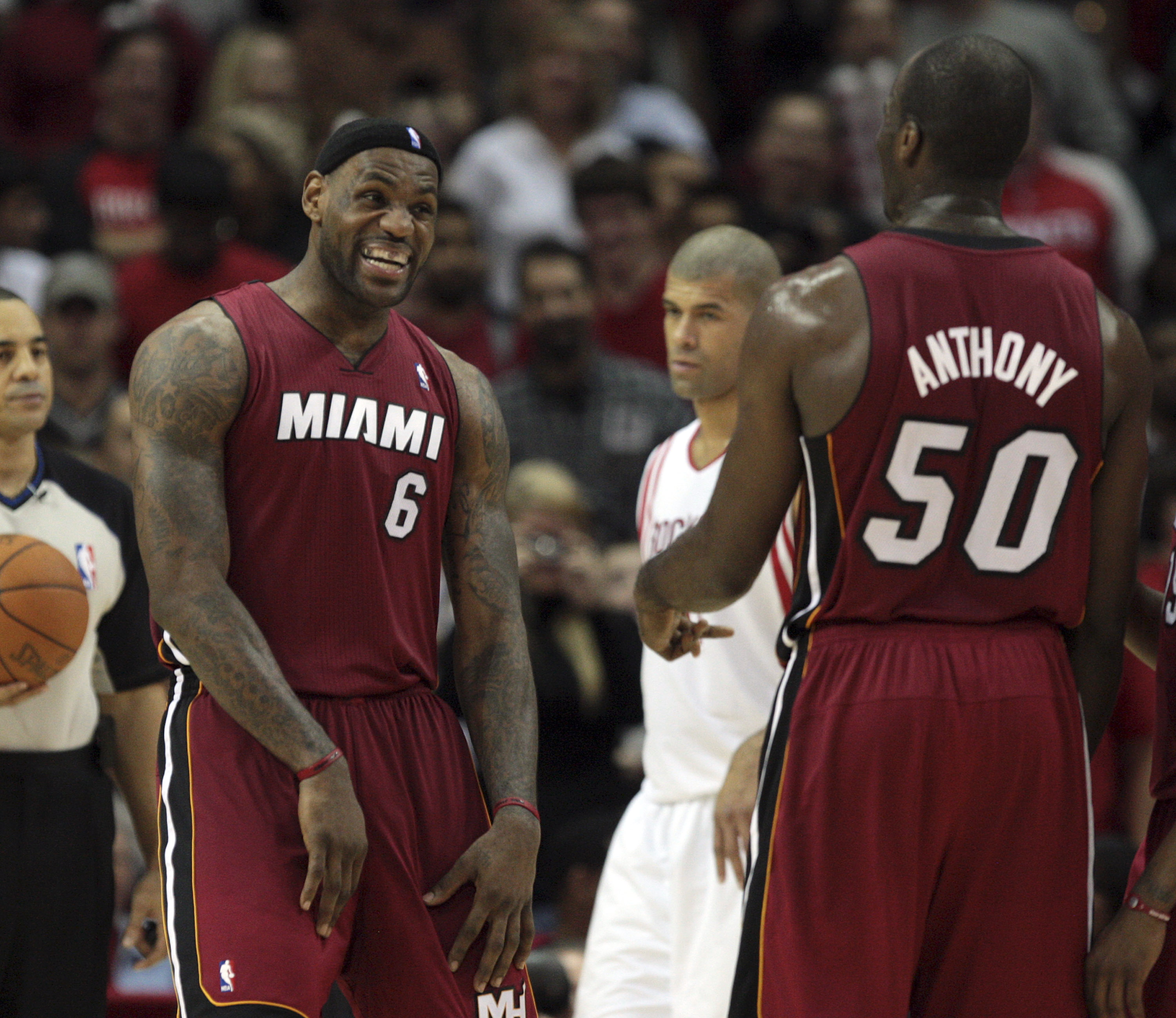 HOUSTON - DECEMBER 29: LeBron James #6 of the Miami Heat laughs it up with Joel Anthony after Anthony made a free throw late in the fourth quarter against the Houston Rockets at Toyota Center on December 29, 2010 in Houston, Texas. Miami won 1125-119. NOT