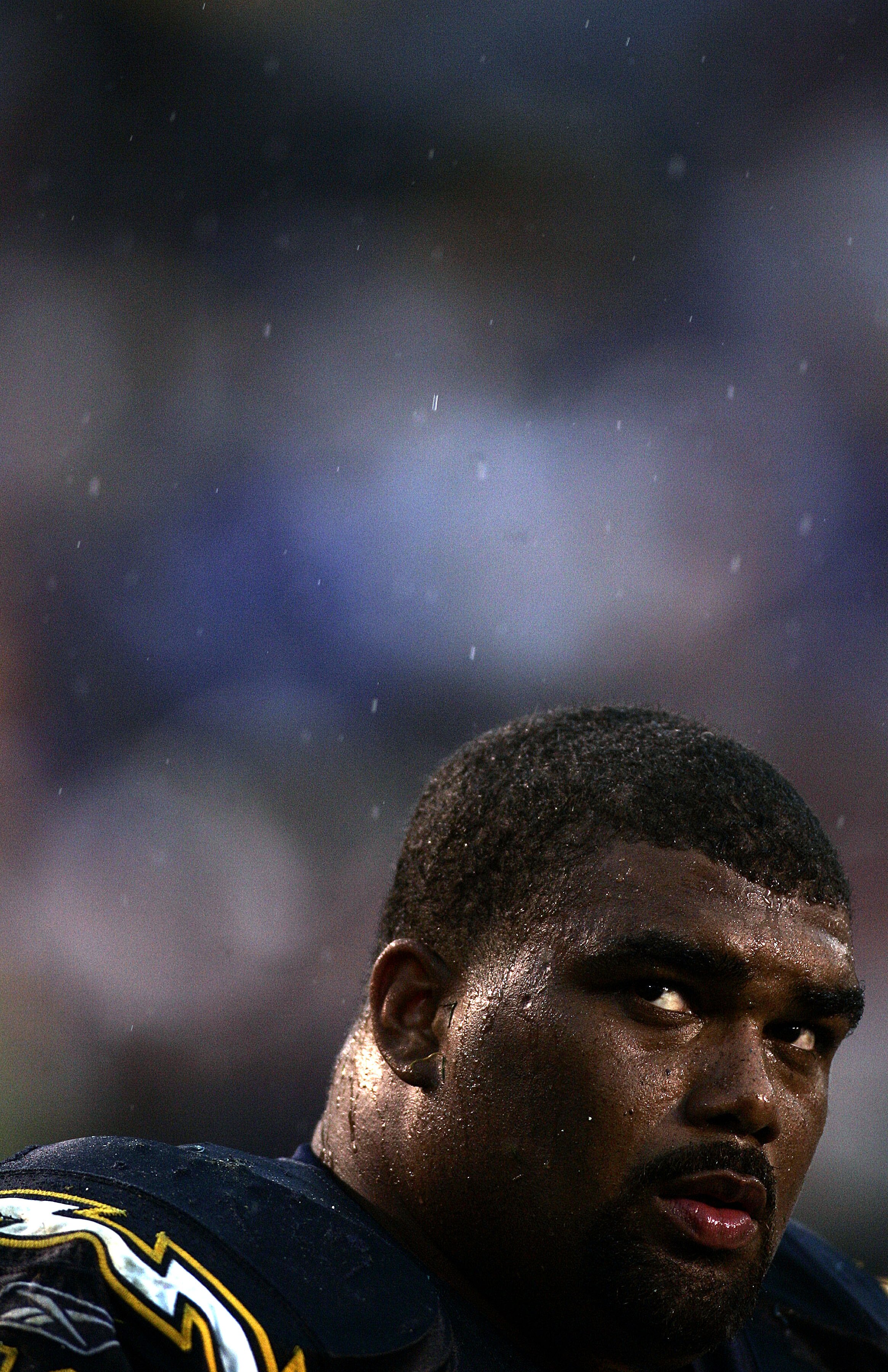 SAN DIEGO - DECEMBER 31:  Defensive tackle Jamal WIlliams #76 of the San Diego Chargers looks on from the sidelines in the final minutes of the 2nd half of their NFL Game on December 31, 2005 at Qualcomm Stadium in San Diego, California.  (Photo by Donald