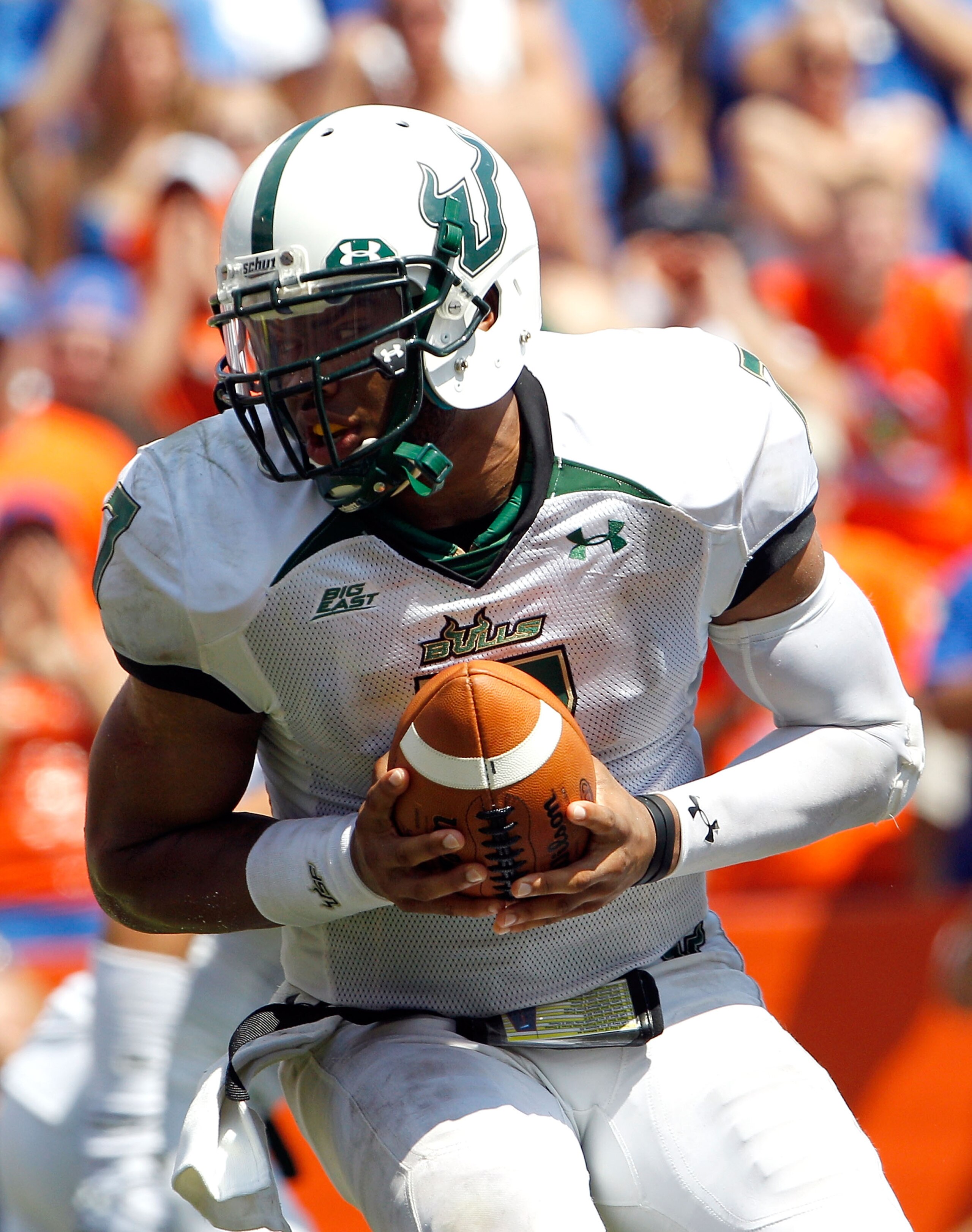 GAINESVILLE, FL - SEPTEMBER 11:  Quarterback B.J. Daniels #7 of the South Florida Bulls attempts a handoff during a game against the Florida Gators at Ben Hill Griffin Stadium on September 11, 2010 in Gainesville, Florida.  (Photo by Sam Greenwood/Getty I