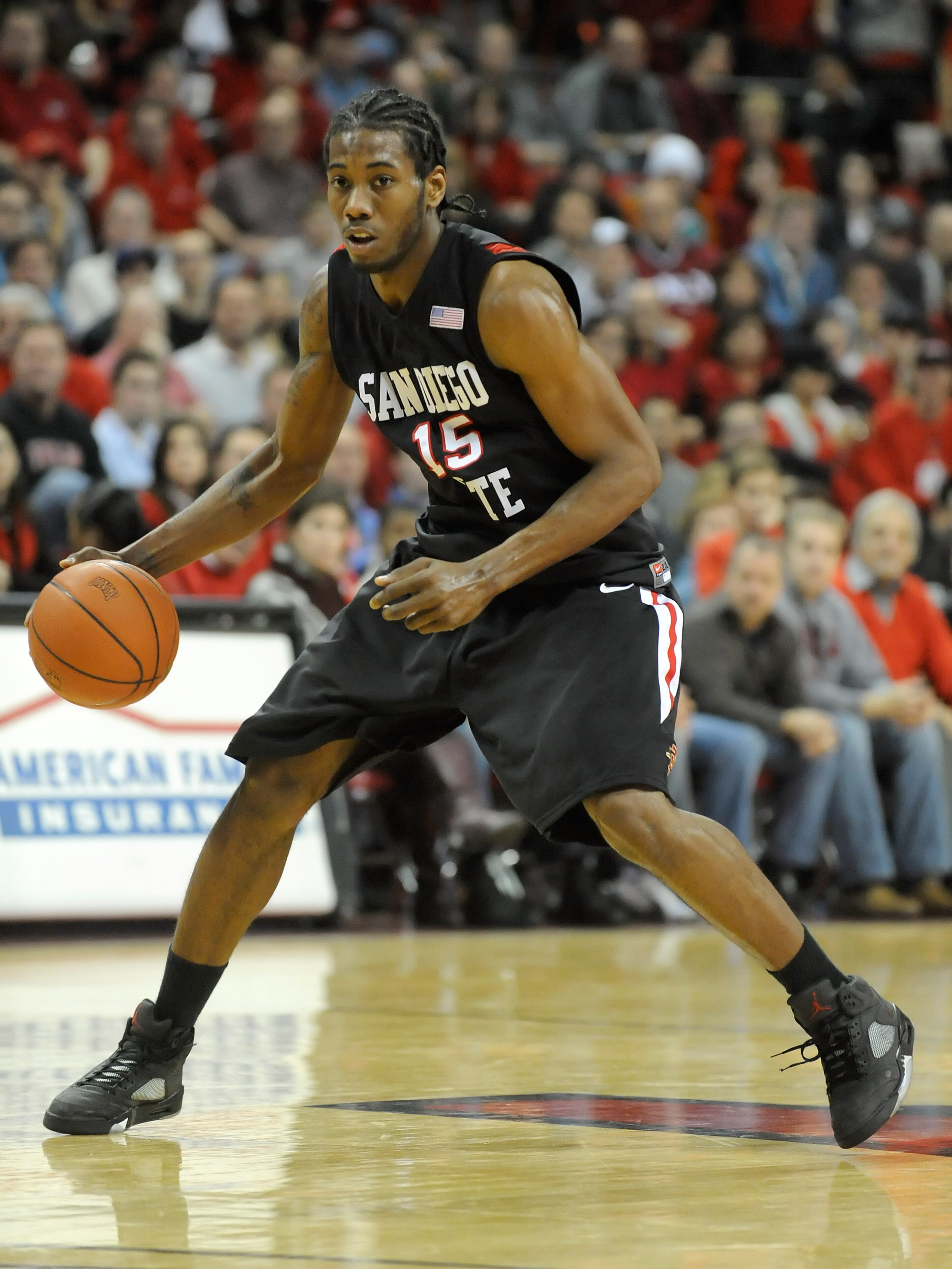 LAS VEGAS - JANUARY 13:  Kawhi Leonard #15 of the San Diego State Aztecs brings the ball up the court during a game against the UNLV Rebels at the Thomas & Mack Center January 13, 2009 in Las Vegas, Nevada. The Rebels defeated the Aztecs 76-66.  (Photo by