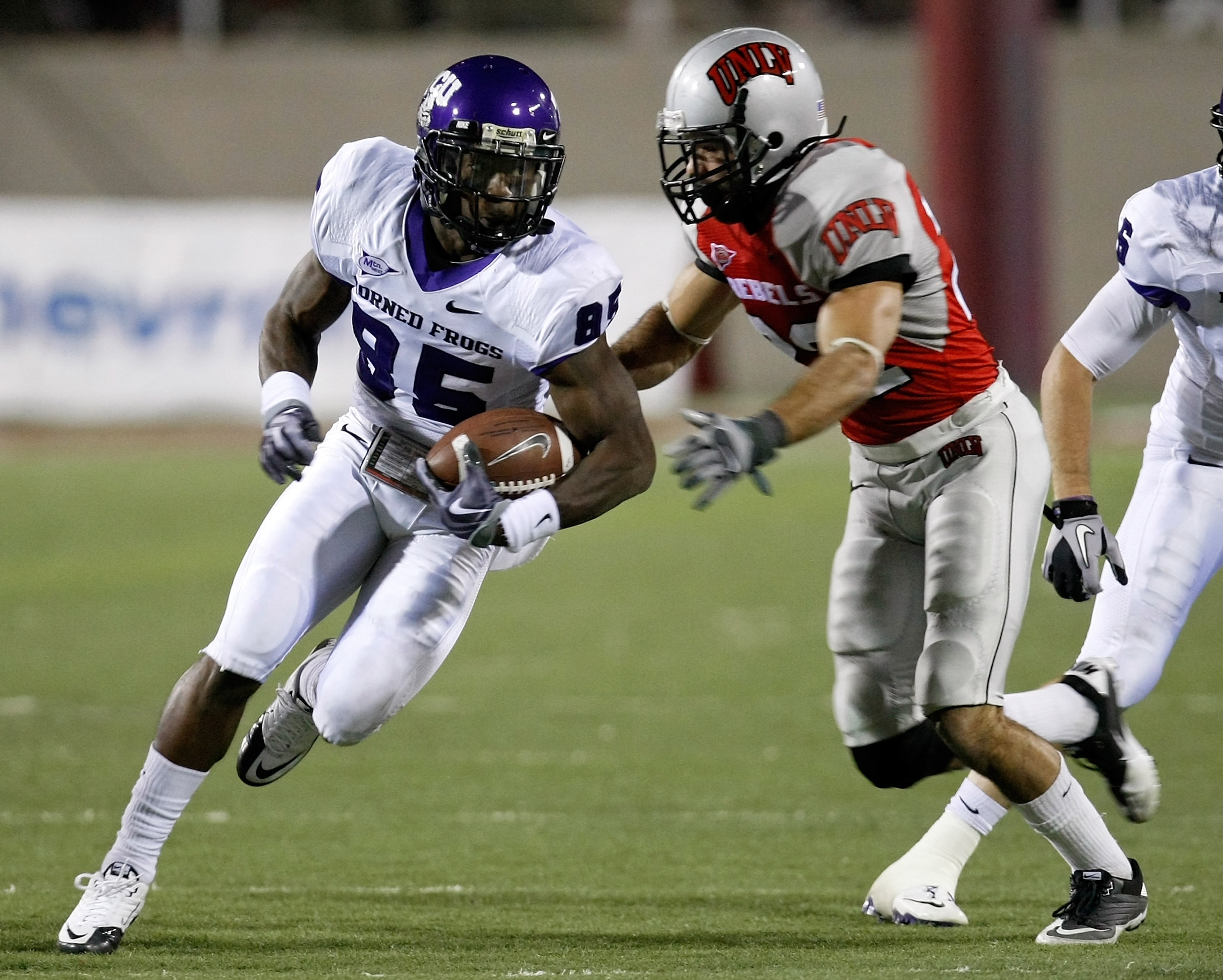 LAS VEGAS - OCTOBER 30: Jeremy Kerley #85 of the Texas Christian University Horned Frogs runs for yardage against Alex De Giacomo #22 of the UNLV Rebels during the third quarter of their game at Sam Boyd Stadium October 30, 2010 in Las Vegas, Nevada. TCU LAS VEGAS - OCTOBER 30: Jeremy Kerley #85 of the Texas Christian University Horned Frogs runs for yardage against Alex De Giacomo #22 of the UNLV Rebels during the third quarter of their game at Sam Boyd Stadium October 30, 2010 in Las Vegas, Nevada. TCU