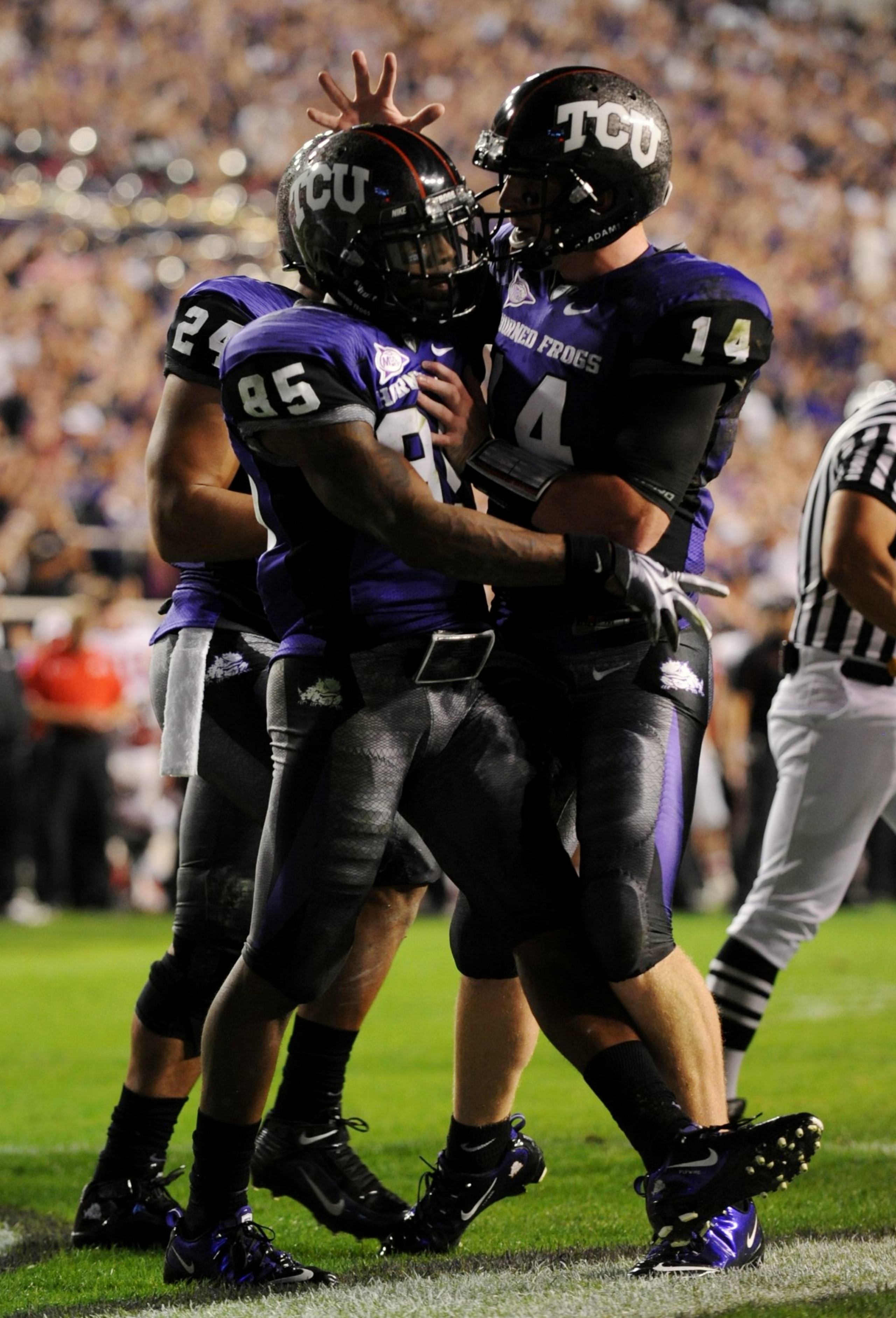 FORT WORTH, TX - NOVEMBER 14: Quarterback Andy Dalton #14 of the TCU Horned Frogs congratulates teammate Jeremy Kerley #85 after a touchdown in the second quarter against the Utah Utes at Amon G. Carter Stadium on November 14, 2009 in Fort Worth, Texas. FORT WORTH, TX - NOVEMBER 14: Quarterback Andy Dalton #14 of the TCU Horned Frogs congratulates teammate Jeremy Kerley #85 after a touchdown in the second quarter against the Utah Utes at Amon G. Carter Stadium on November 14, 2009 in Fort Worth, Texas.