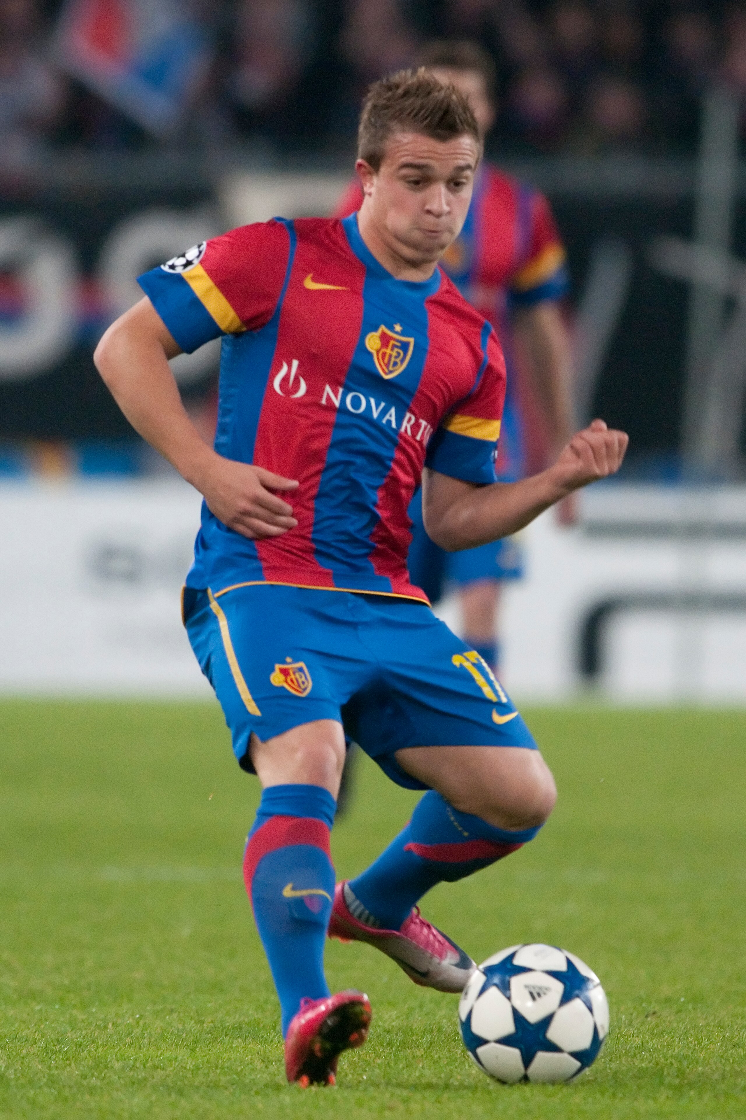 BASEL, SWITZERLAND - NOVEMBER 03:  Xherdan Shaqiri of FC Basel during the UEFA Champions League Group E match between FC Basel and AS Roma at St Jakob-Park Stadium on November 3, 2010 in Basel, Switzerland.  (Photo by Sebastien Bozon/EuroFootball/Getty Im