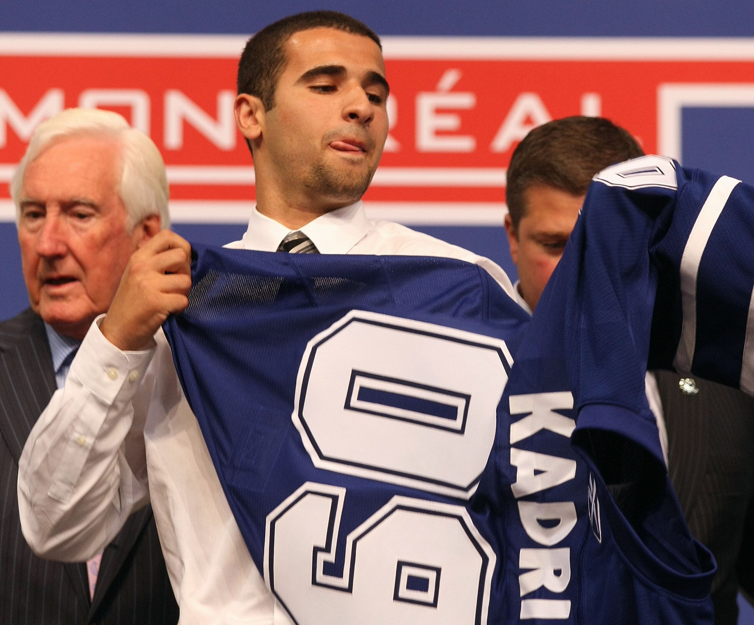 MONTREAL, QC - JUNE 26: Nazem Kadri puts on his new Toronto Maple Leafs sweater after he was selected #7 overall by the Leafs during the first round of the 2009 NHL Entry Draft at the Bell Centre on June 26, 2009 in Montreal, Quebec, Canada. (Photo by B MONTREAL, QC - JUNE 26: Nazem Kadri puts on his new Toronto Maple Leafs sweater after he was selected #7 overall by the Leafs during the first round of the 2009 NHL Entry Draft at the Bell Centre on June 26, 2009 in Montreal, Quebec, Canada. (Photo by B