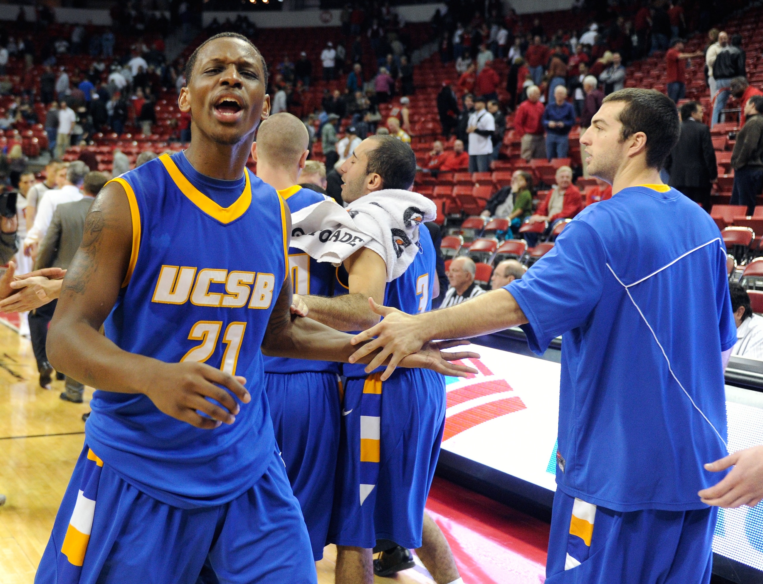 LAS VEGAS, NV - DECEMBER 15: James Nunnally #21 and Christian Peterson #24 of the UC Santa Barbara Gauchos celebrate their 68-62 win over the UNLV Rebels at the Thomas & Mack Center December 15, 2010 in Las Vegas, Nevada. (Photo by Ethan Miller/Getty Im LAS VEGAS, NV - DECEMBER 15: James Nunnally #21 and Christian Peterson #24 of the UC Santa Barbara Gauchos celebrate their 68-62 win over the UNLV Rebels at the Thomas & Mack Center December 15, 2010 in Las Vegas, Nevada. (Photo by Ethan Miller/Getty Im