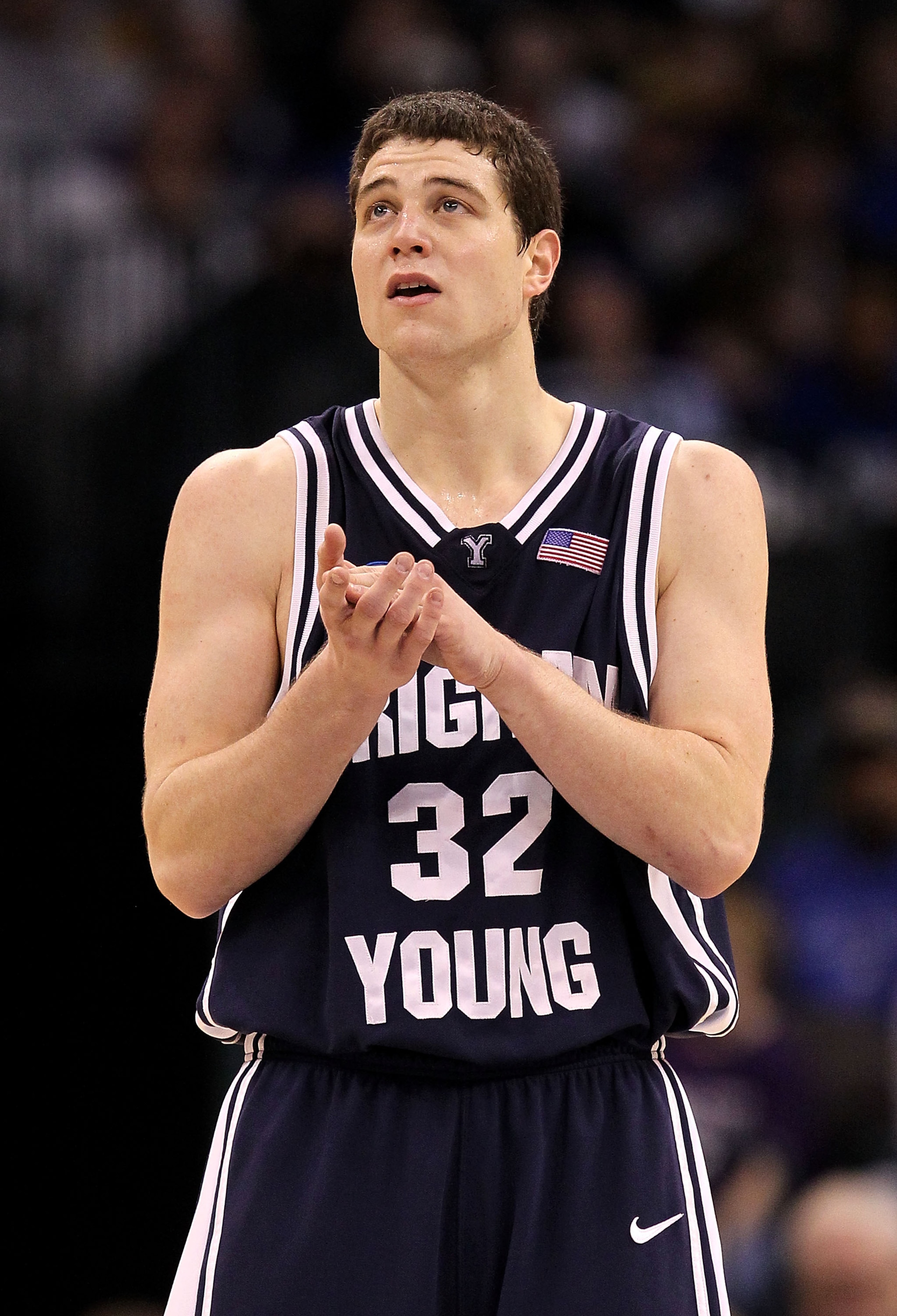 OKLAHOMA CITY - MARCH 20: Jimmer Fredette #32 of the Brigham Young Cougars looks on against the Kansas State Wildcats during the second round of the 2010 NCAA men's basketball tournament at Ford Center on March 20, 2010 in Oklahoma City, Oklahoma. (Phot OKLAHOMA CITY - MARCH 20: Jimmer Fredette #32 of the Brigham Young Cougars looks on against the Kansas State Wildcats during the second round of the 2010 NCAA men's basketball tournament at Ford Center on March 20, 2010 in Oklahoma City, Oklahoma. (Phot