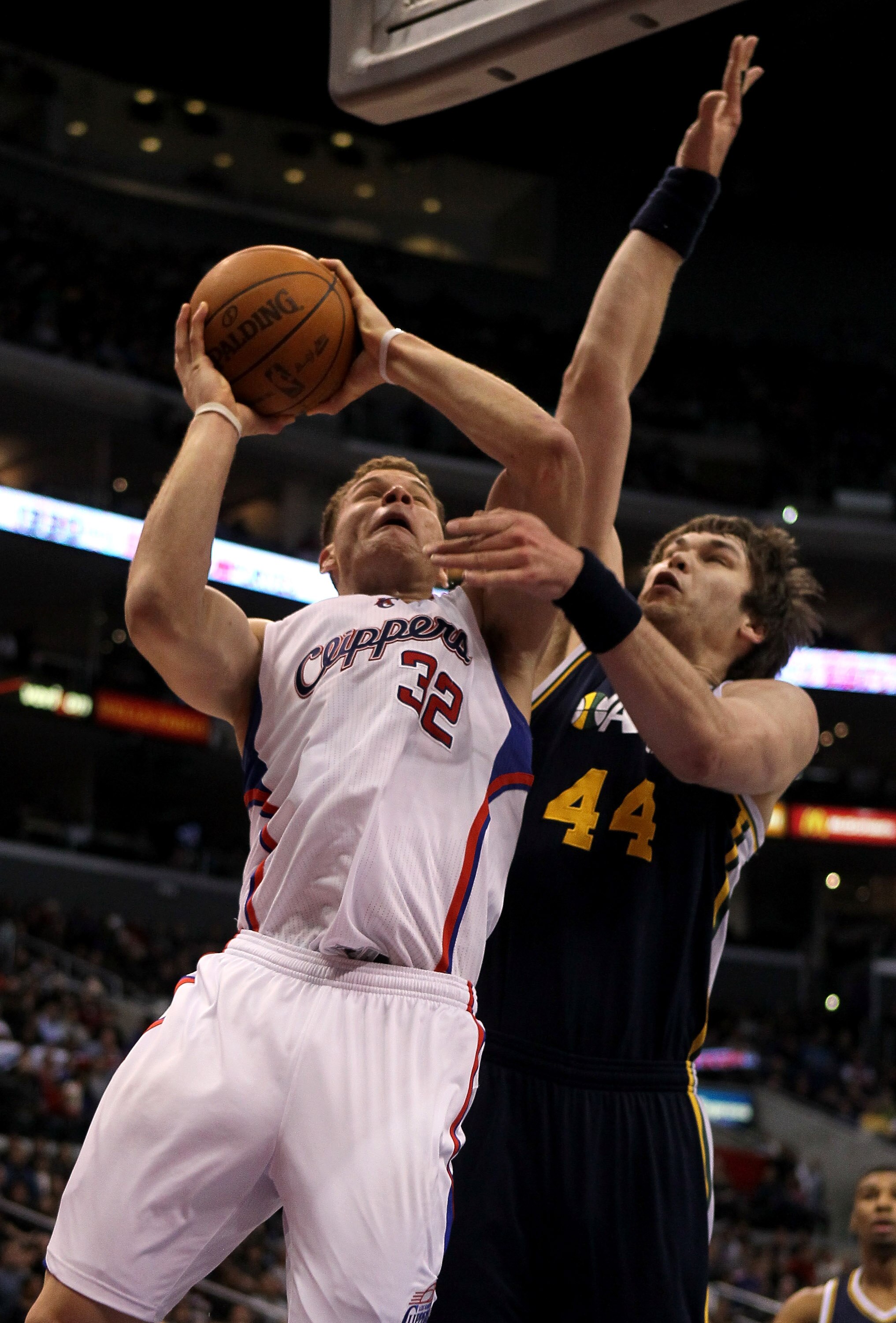 LOS ANGELES, CA - DECEMBER 29:  Blake Griffin #32 of  the Los Angeles Clippers goes up for a shot against Kyrylo Fesenko #44 of the Utah Jazz at Staples Center on December 29, 2010 in Los Angeles, California. The Jazz won 103-85.  NOTE TO USER: User expre