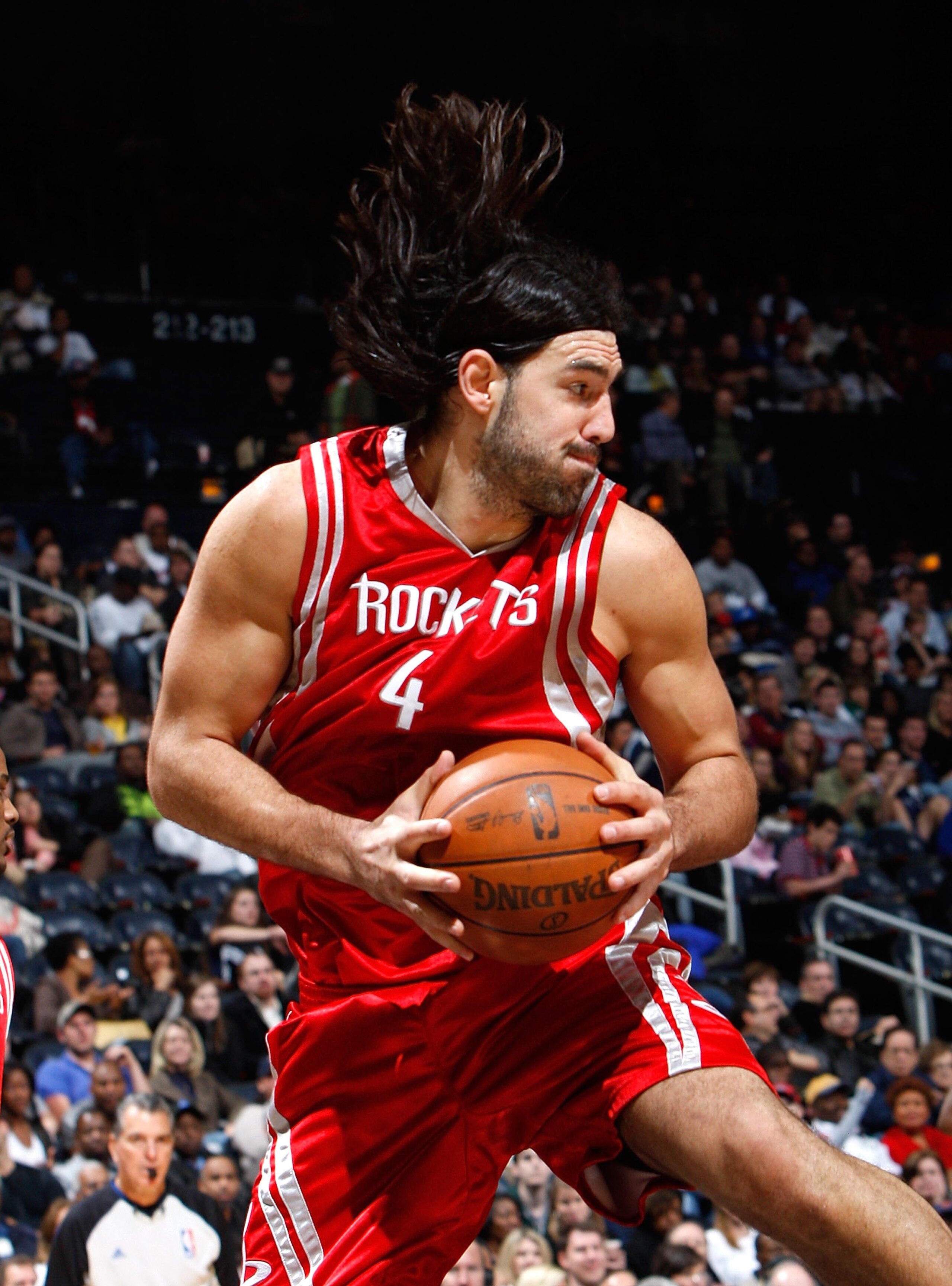 ATLANTA - NOVEMBER 20:  Luis Scola #4 of the Houston Rockets against the Atlanta Hawks at Philips Arena on November 20, 2009 in Atlanta, Georgia.  NOTE TO USER: User expressly acknowledges and agrees that, by downloading and/or using this Photograph, User