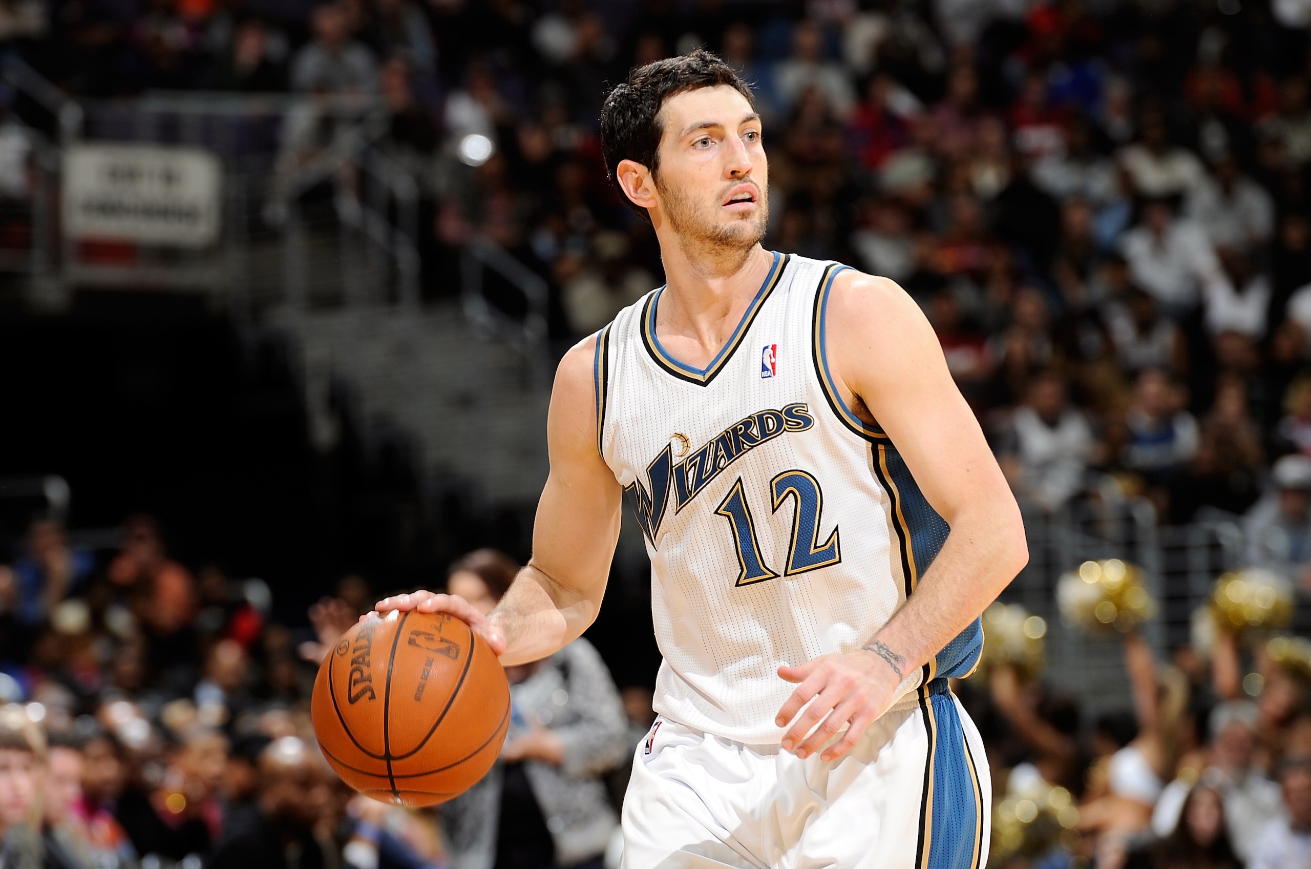 WASHINGTON, DC - DECEMBER 18:  Kirk Hinrich #12 of the Washington Wizards handles the ball against the Miami Heat at the Verizon Center on December 18, 2010 in Washington, DC. NOTE TO USER: User expressly acknowledges and agrees that, by downloading and o