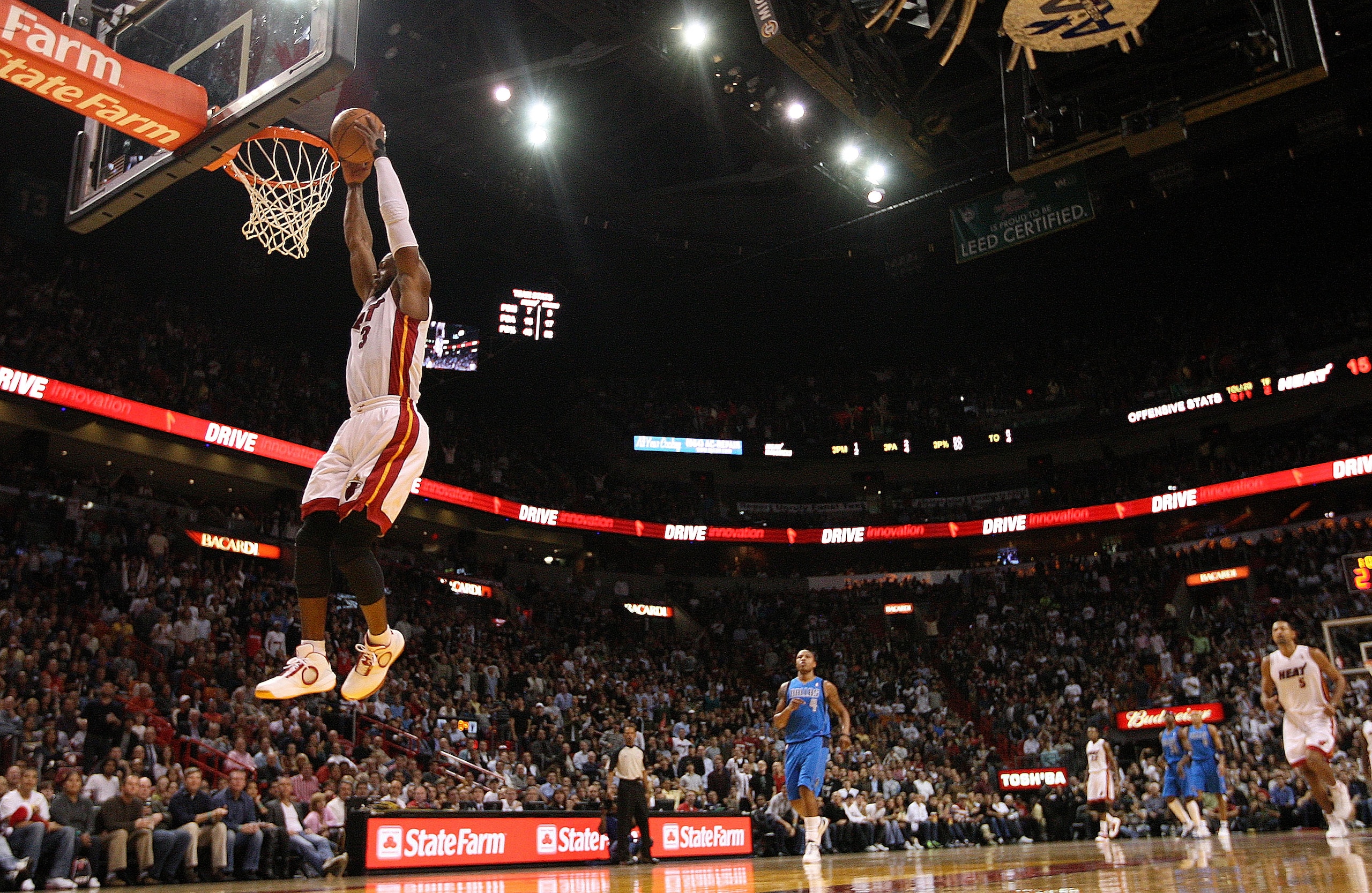 MIAMI, FL - DECEMBER 20: Dwyane Wade #3 of the Miami Heat dunks during a game against the Dallas Mavericks at American Airlines Arena on December 20, 2010 in Miami, Florida. NOTE TO USER: User expressly acknowledges and agrees that, by downloading and/or MIAMI, FL - DECEMBER 20: Dwyane Wade #3 of the Miami Heat dunks during a game against the Dallas Mavericks at American Airlines Arena on December 20, 2010 in Miami, Florida. NOTE TO USER: User expressly acknowledges and agrees that, by downloading and/or
