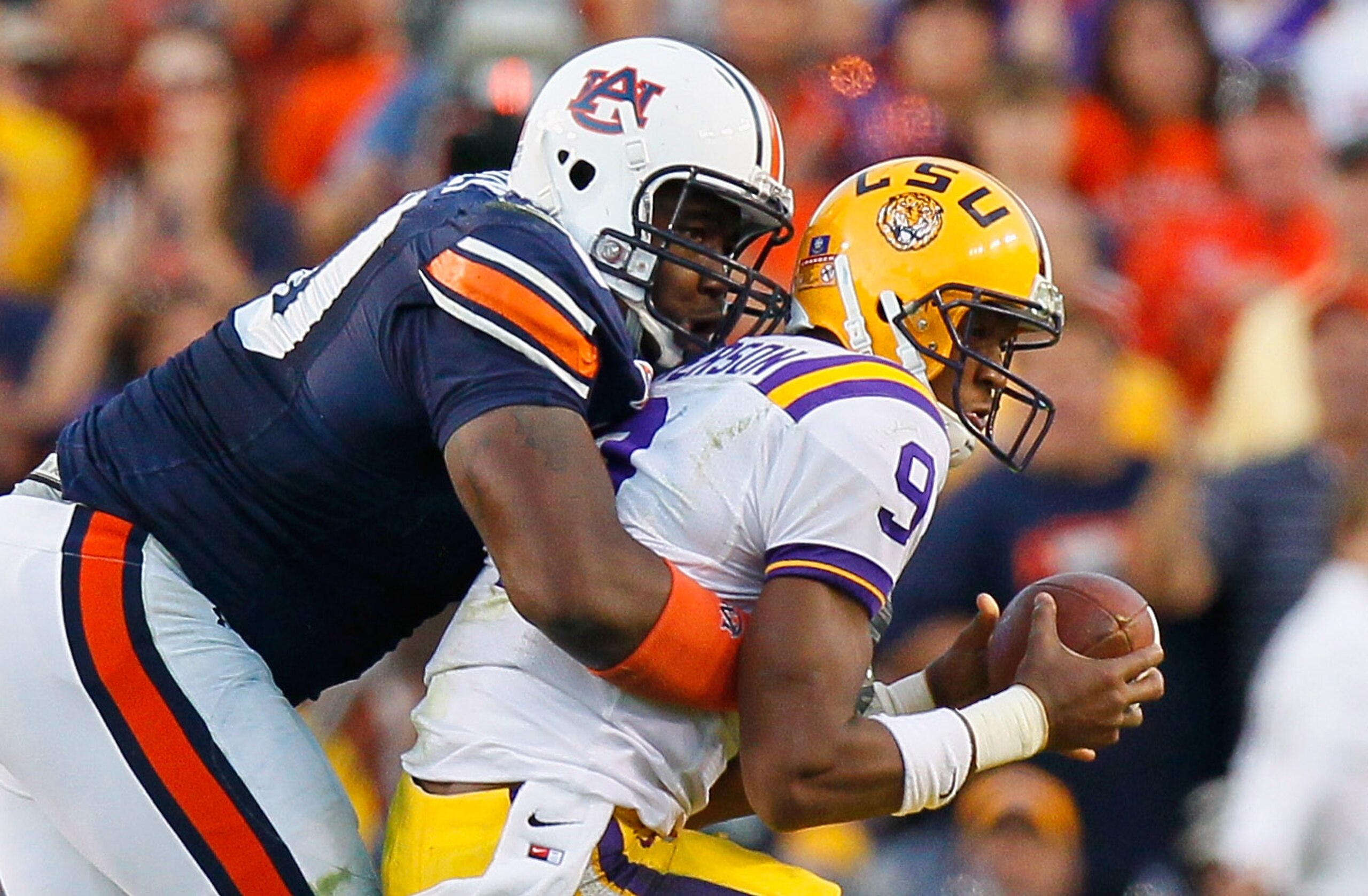 AUBURN, AL - OCTOBER 23:  Nick Fairley #90 of the Auburn Tigers sacks quarterback Jordan Jefferson #9 of the LSU Tigers at Jordan-Hare Stadium on October 23, 2010 in Auburn, Alabama.  (Photo by Kevin C. Cox/Getty Images)