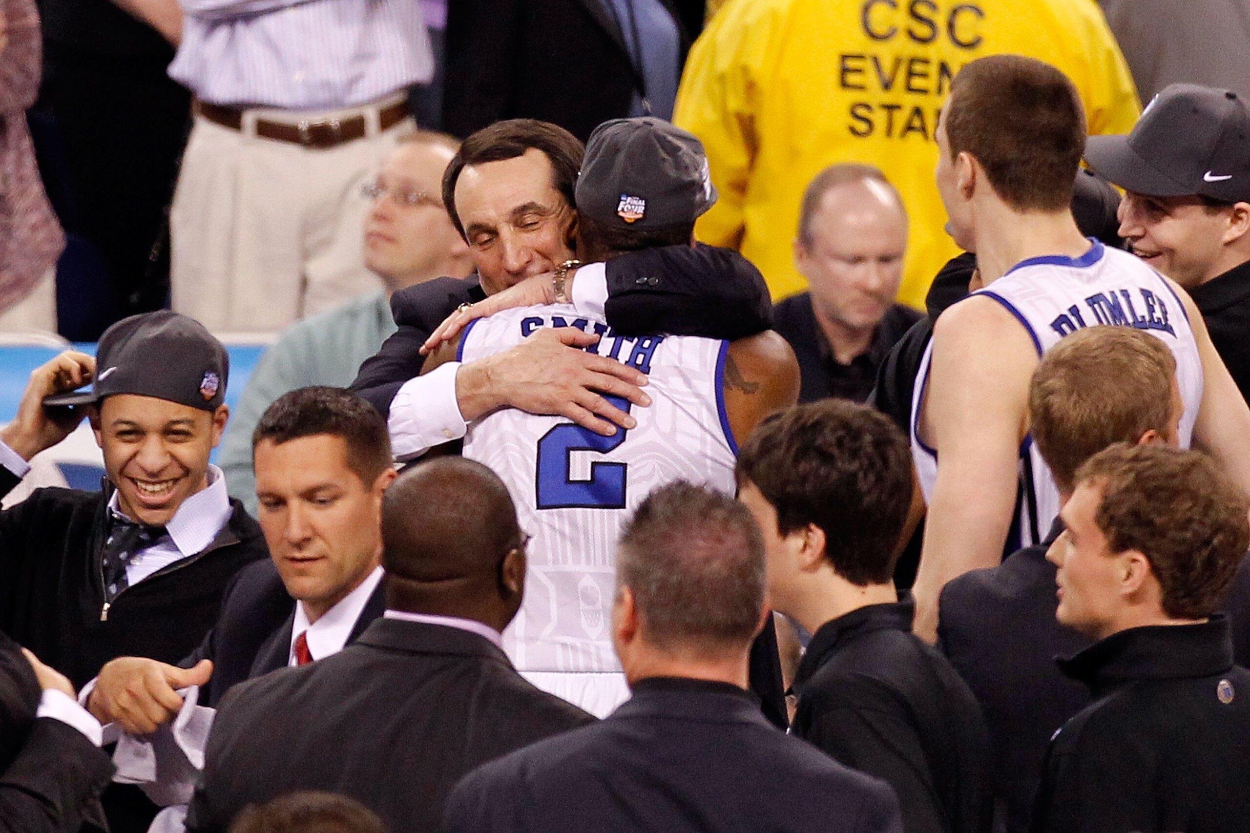 INDIANAPOLIS - APRIL 05: Head coach Mike Krzyzewski of the Duke Blue Devils hugs Nolan Smith #2 following Duke's 61-59 win against the Butler Bulldogs during the 2010 NCAA Division I Men's Basketball National Championship game at Lucas Oil Stadium on Apr INDIANAPOLIS - APRIL 05: Head coach Mike Krzyzewski of the Duke Blue Devils hugs Nolan Smith #2 following Duke's 61-59 win against the Butler Bulldogs during the 2010 NCAA Division I Men's Basketball National Championship game at Lucas Oil Stadium on Apr