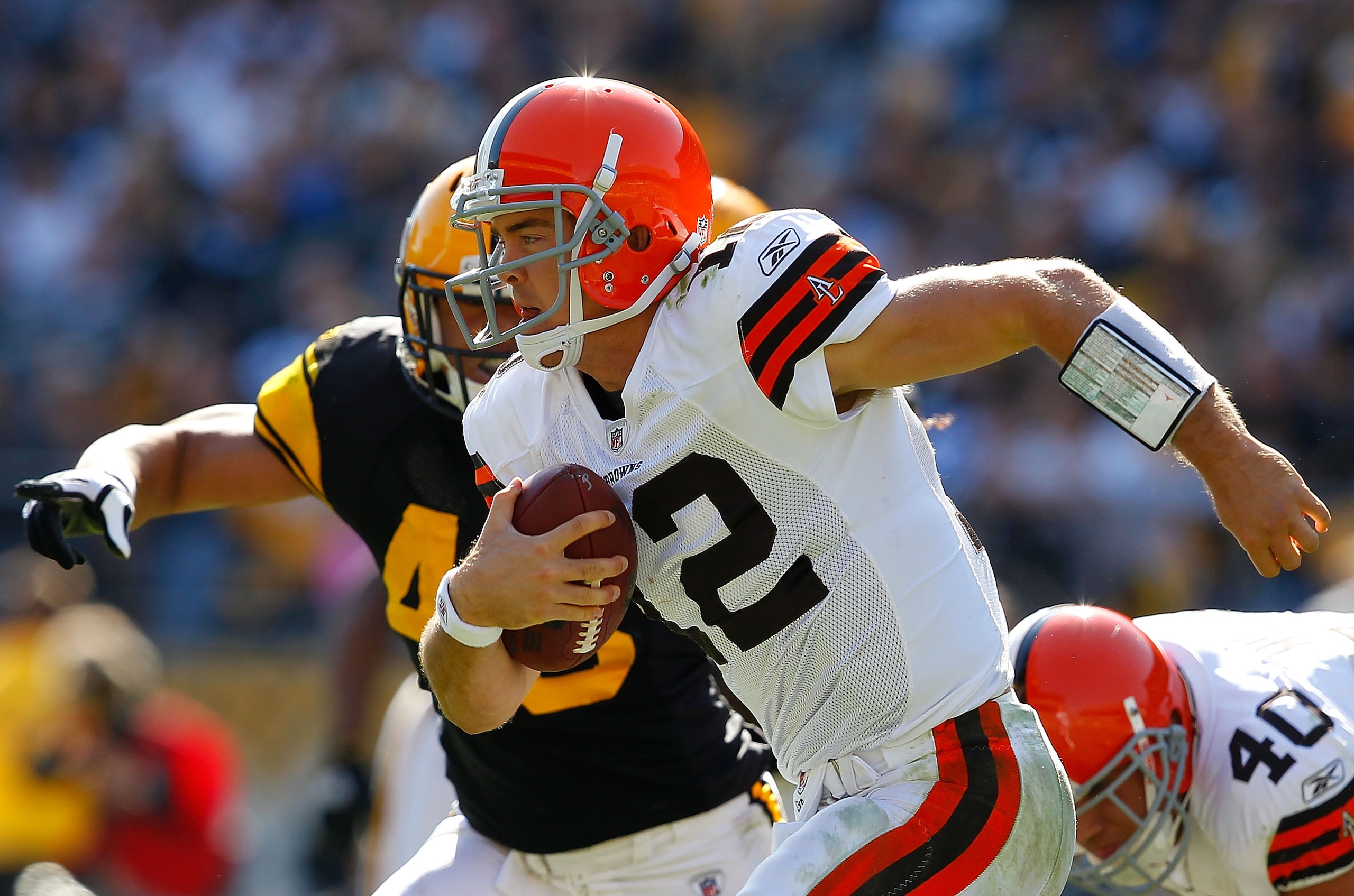PITTSBURGH - OCTOBER 17:  Colt McCoy #12 of the Cleveland Browns scambles away from the Pittsburgh Steelers defense during the game on October 17, 2010 at Heinz Field in Pittsburgh, Pennsylvania.  (Photo by Jared Wickerham/Getty Images)