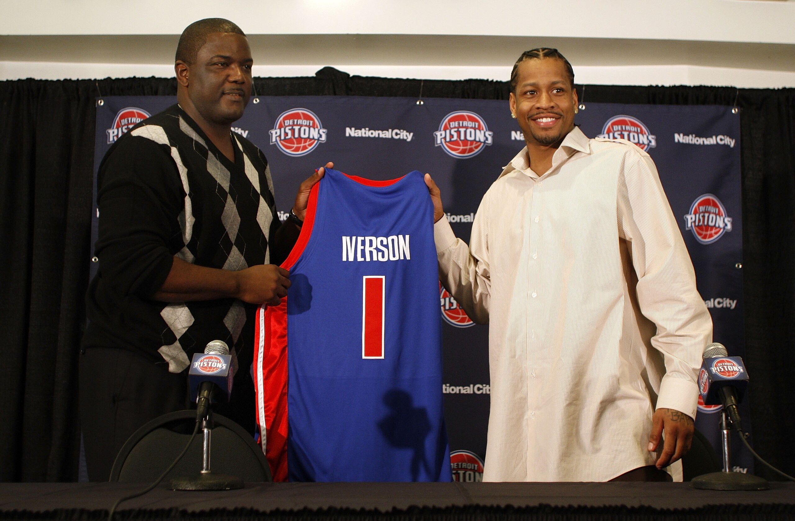 AUBURN HILLS, MI - NOVEMBER 04:  Allen Iverson #1 of the Detroit Pistons is introduced at press conference by President of Basketball Operations Joe Dumars after being traded from the Denver Nuggets on November 4, 2008 at the Palace of Auburn Hills in Aub