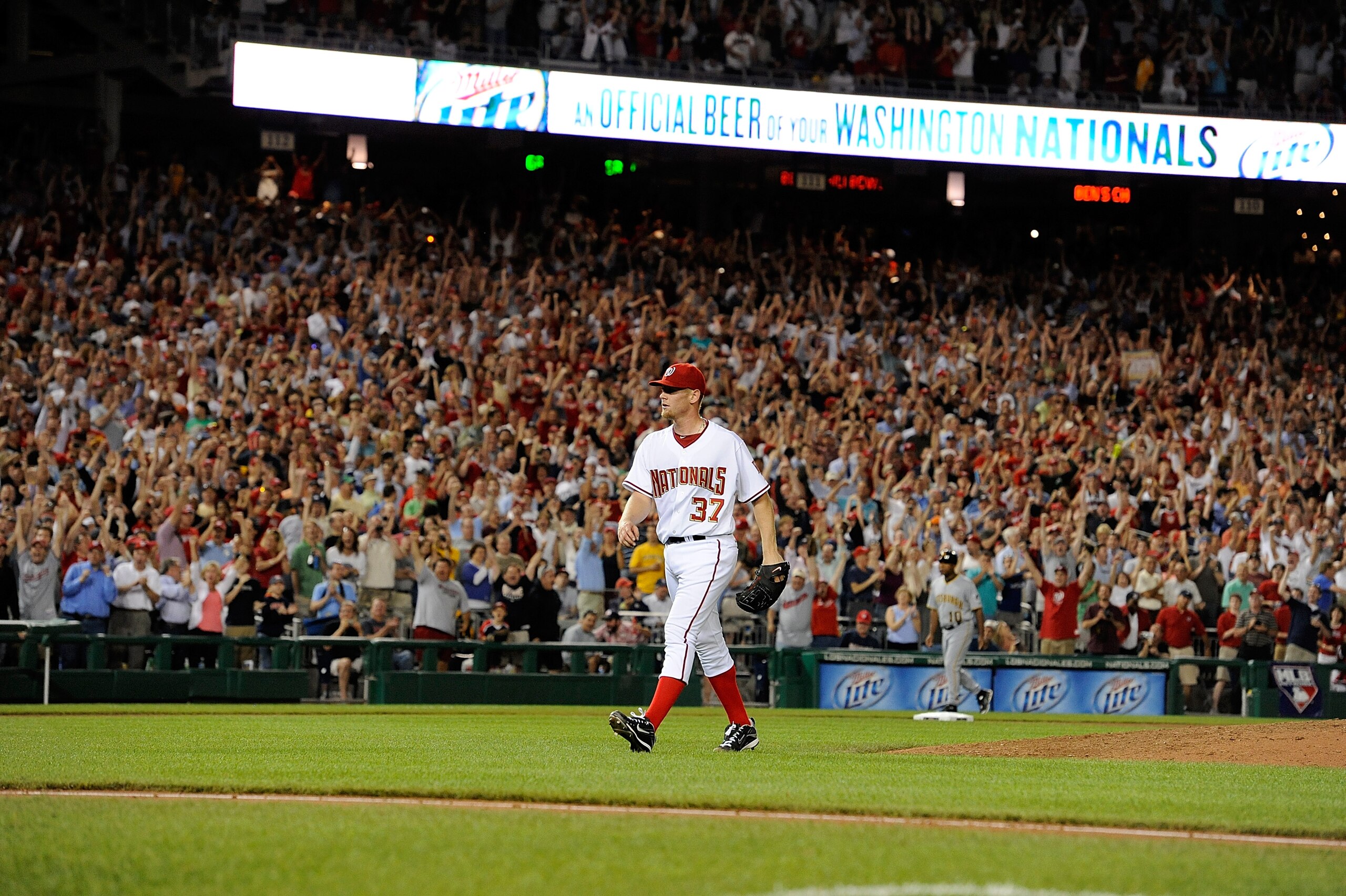 WASHINGTON - JUNE 08:  Stephen Strasburg #37 of the Washington Nationals walks off the field after the seventh inning of the game against the Pittsburgh Pirates at Nationals Park on June 8, 2010 in Washington, DC. Strasburg struck out 14 batters in his ma