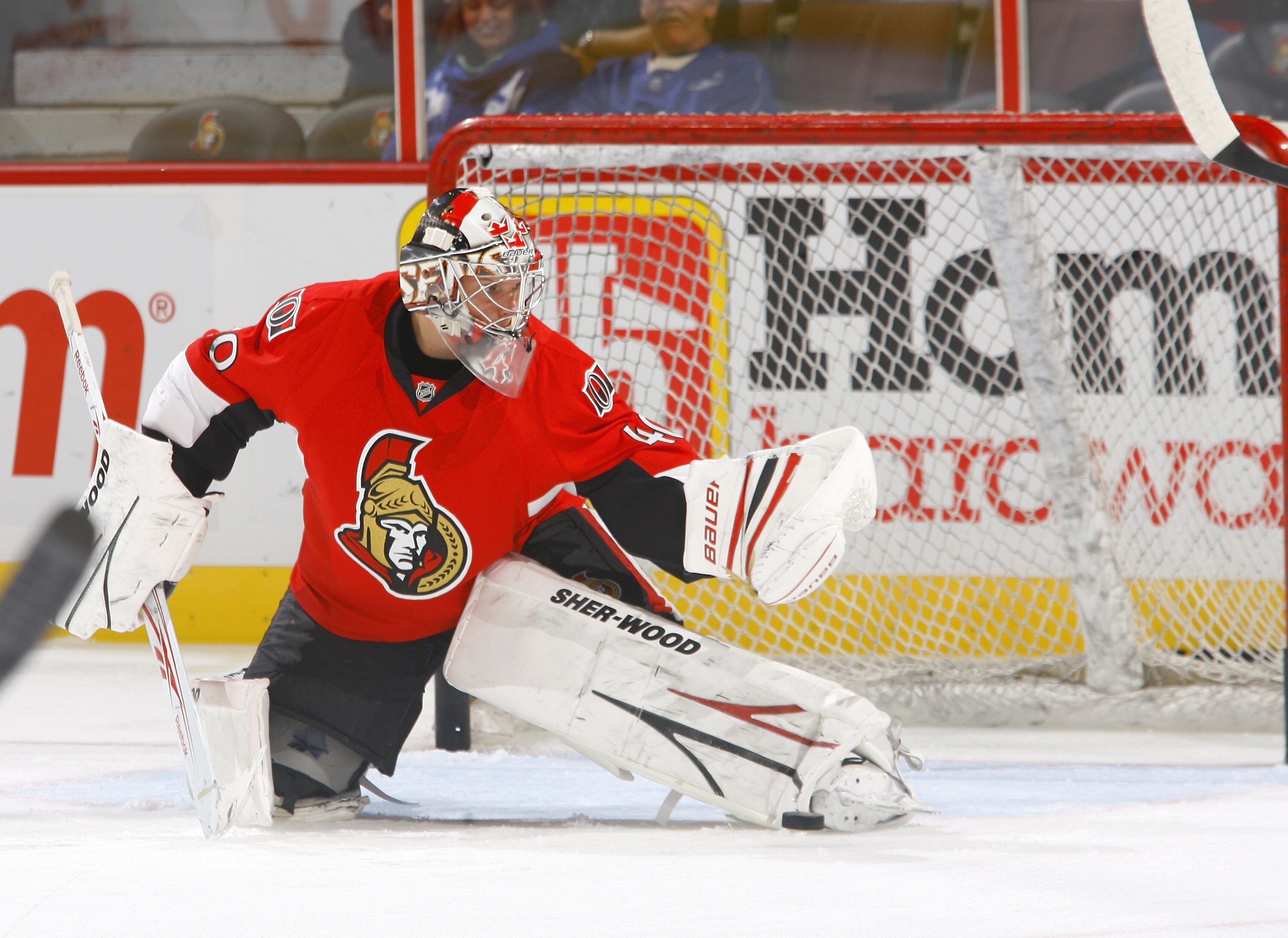 KANATA, ON - SEPTEMBER 29:  Robin Lehner #40 of the Ottawa Senators makes a glove save during warmup before a game against the Toronto Maple Leafs at Scotiabank Place on September 29, 2010 in Kanata, Canada.  (Photo by Phillip MacCallum/Getty Images)