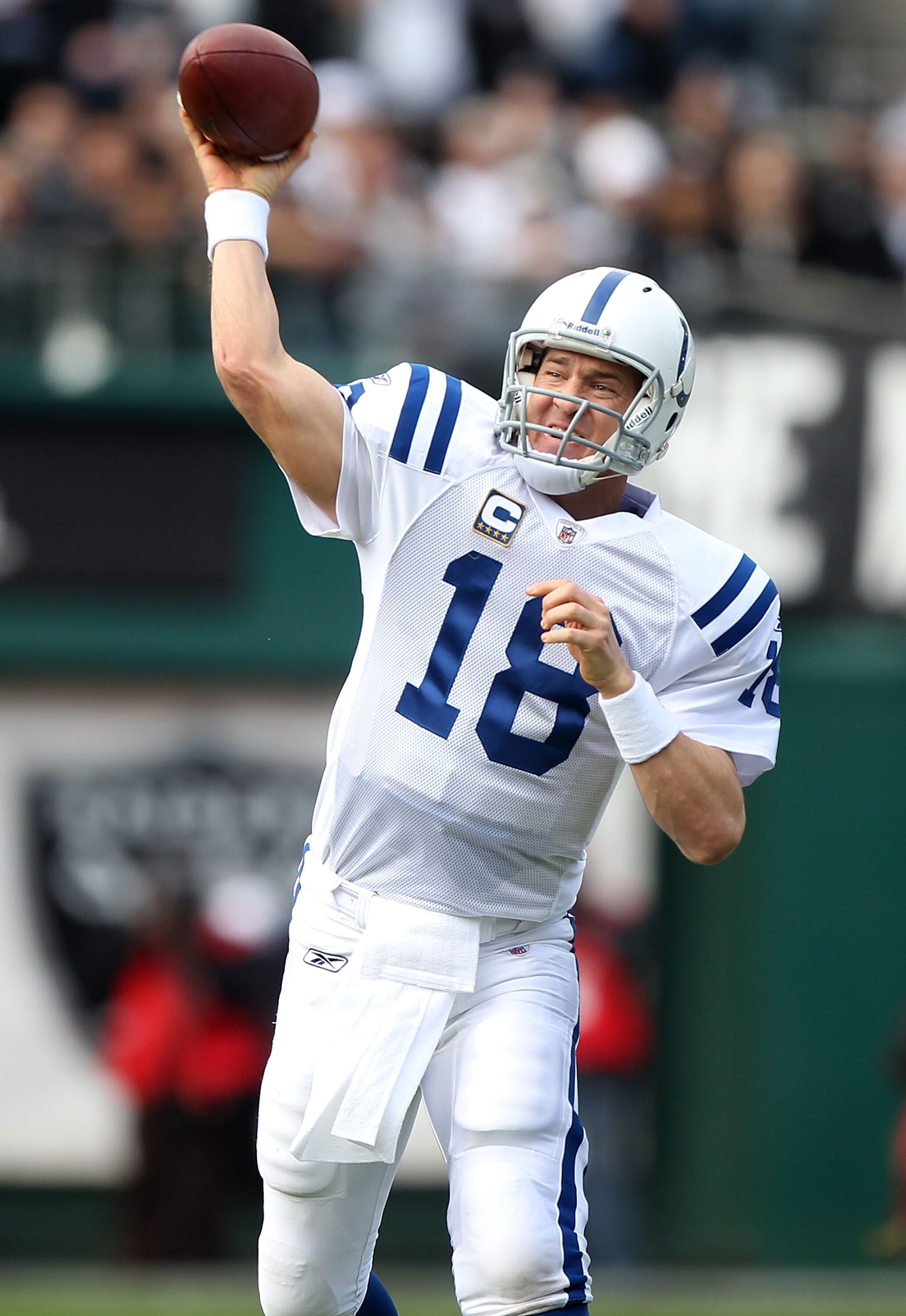 OAKLAND, CA - DECEMBER 26:  Peyton Manning #18 of the Indianapolis Colts passes against the Oakland Raiders during an NFL game at Oakland-Alameda County Coliseum on December  26, 2010 in Oakland, California.  (Photo by Jed Jacobsohn/Getty Images)