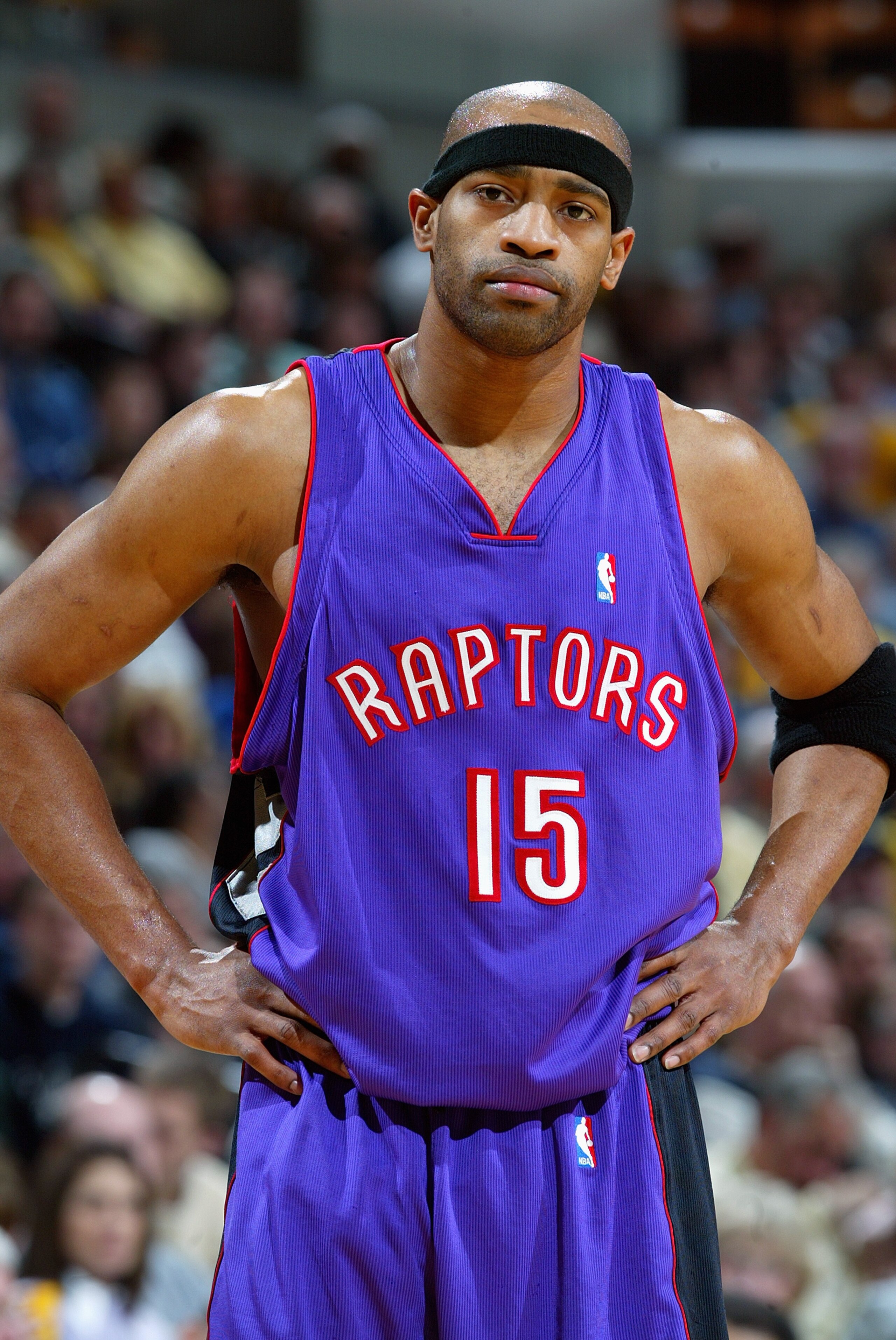 INDIANAPOLIS - MARCH 9: Vince Carter #15 of the Toronto Raptors stands on the court during the game against the Indiana Pacers at Conseco Fieldhouse on March 9, 2004 in Indianapolis, Indiana. The Raptors won 94-84. NOTE TO USER: User expressly acknowle INDIANAPOLIS - MARCH 9: Vince Carter #15 of the Toronto Raptors stands on the court during the game against the Indiana Pacers at Conseco Fieldhouse on March 9, 2004 in Indianapolis, Indiana. The Raptors won 94-84. NOTE TO USER: User expressly acknowle