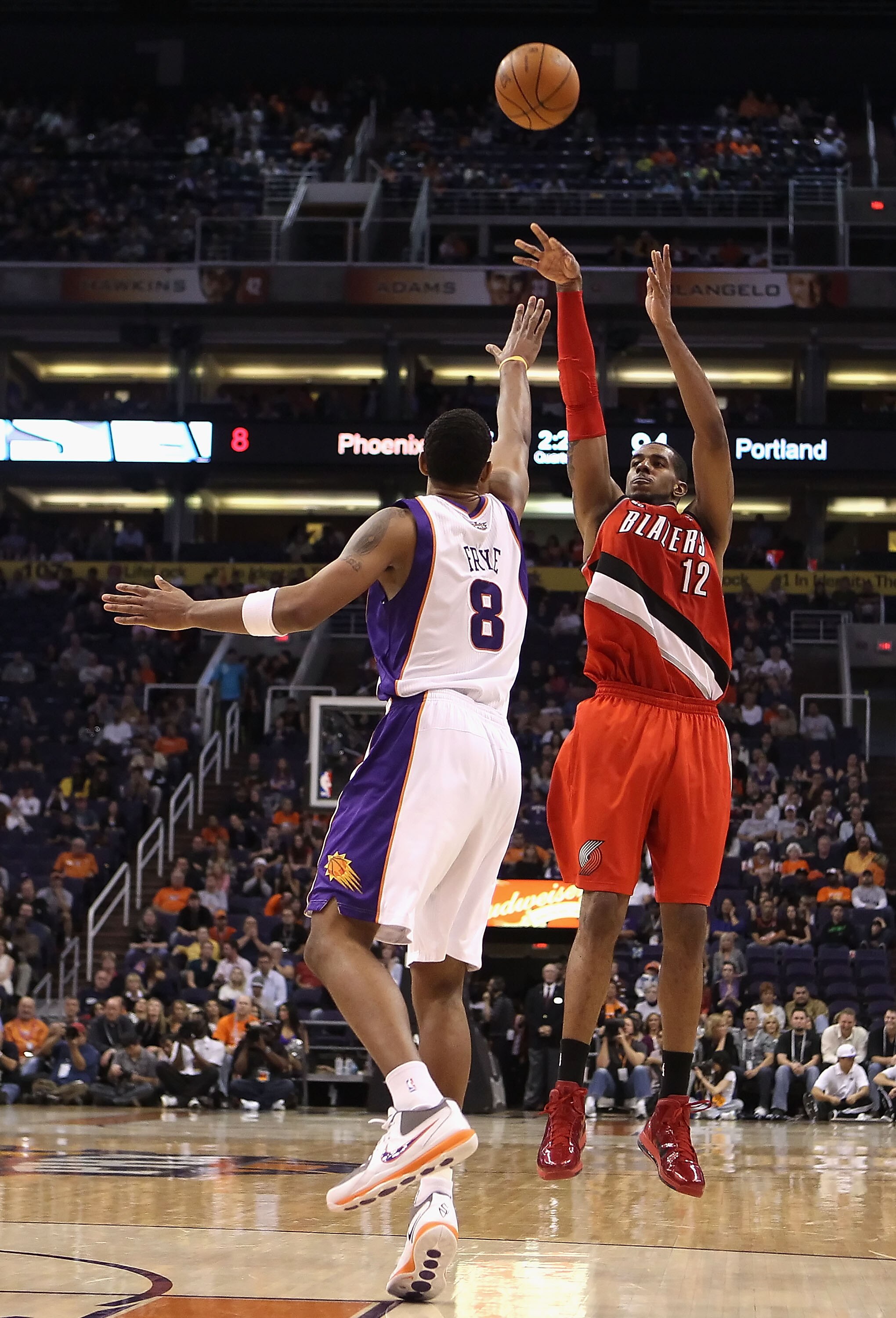 PHOENIX - DECEMBER 10:  LaMarcus Aldridge #12 of the Portland Trail Blazers puts up a shot during the NBA game against the Phoenix Suns at US Airways Center on December 10, 2010 in Phoenix, Arizona. The Trail Blazers defeated the Suns 101-94.  NOTE TO USE
