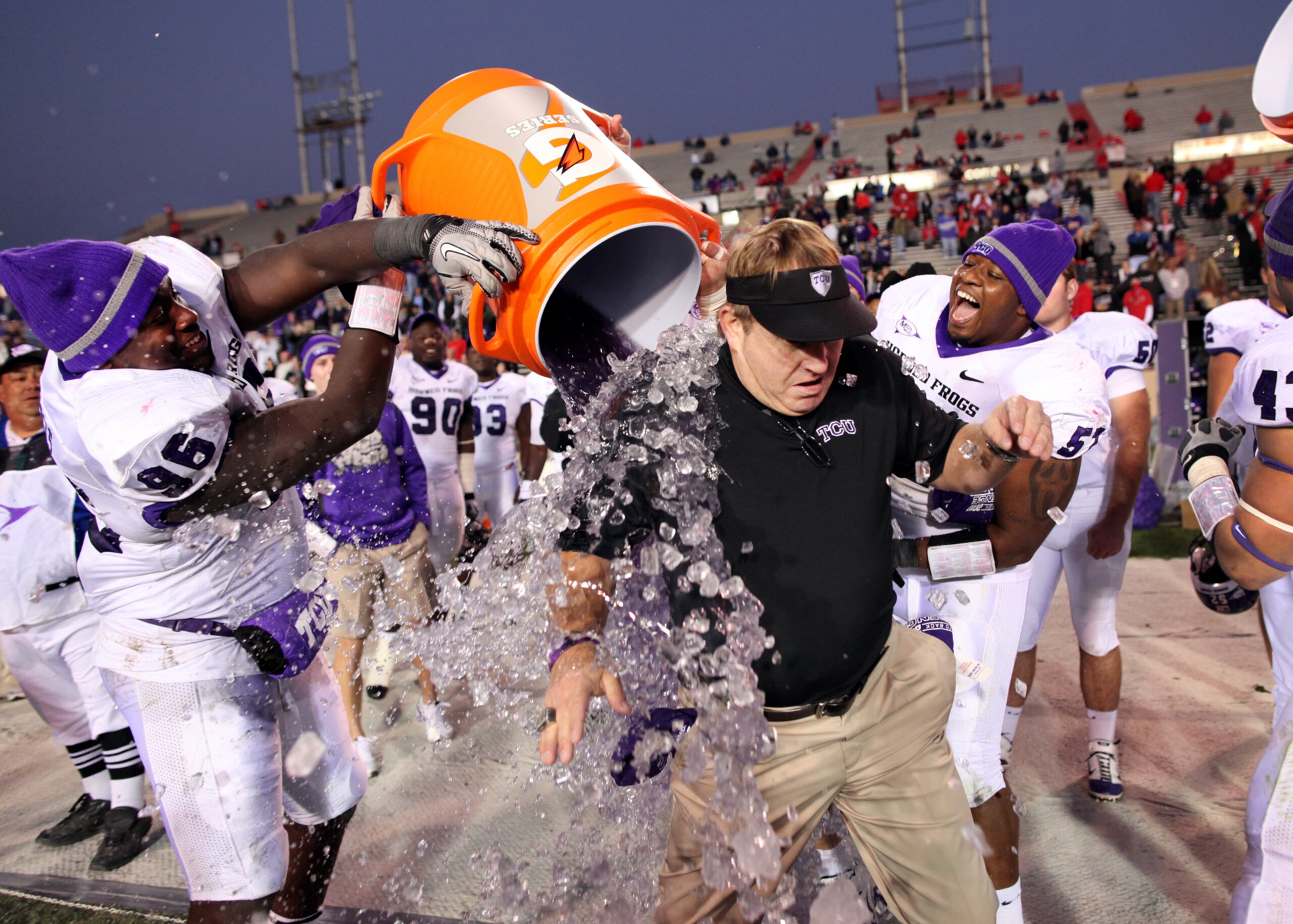 ALBUQUERQUE, NM - NOVEMBER 27: Head coach Gary Patterson of the TCU Horned Frogs is doused with Gatorade by his players while celebrating their win over the New Mexico Lobos on November 27, 2010 at University Stadium in Albuquerque, New Mexico. TCU won 66