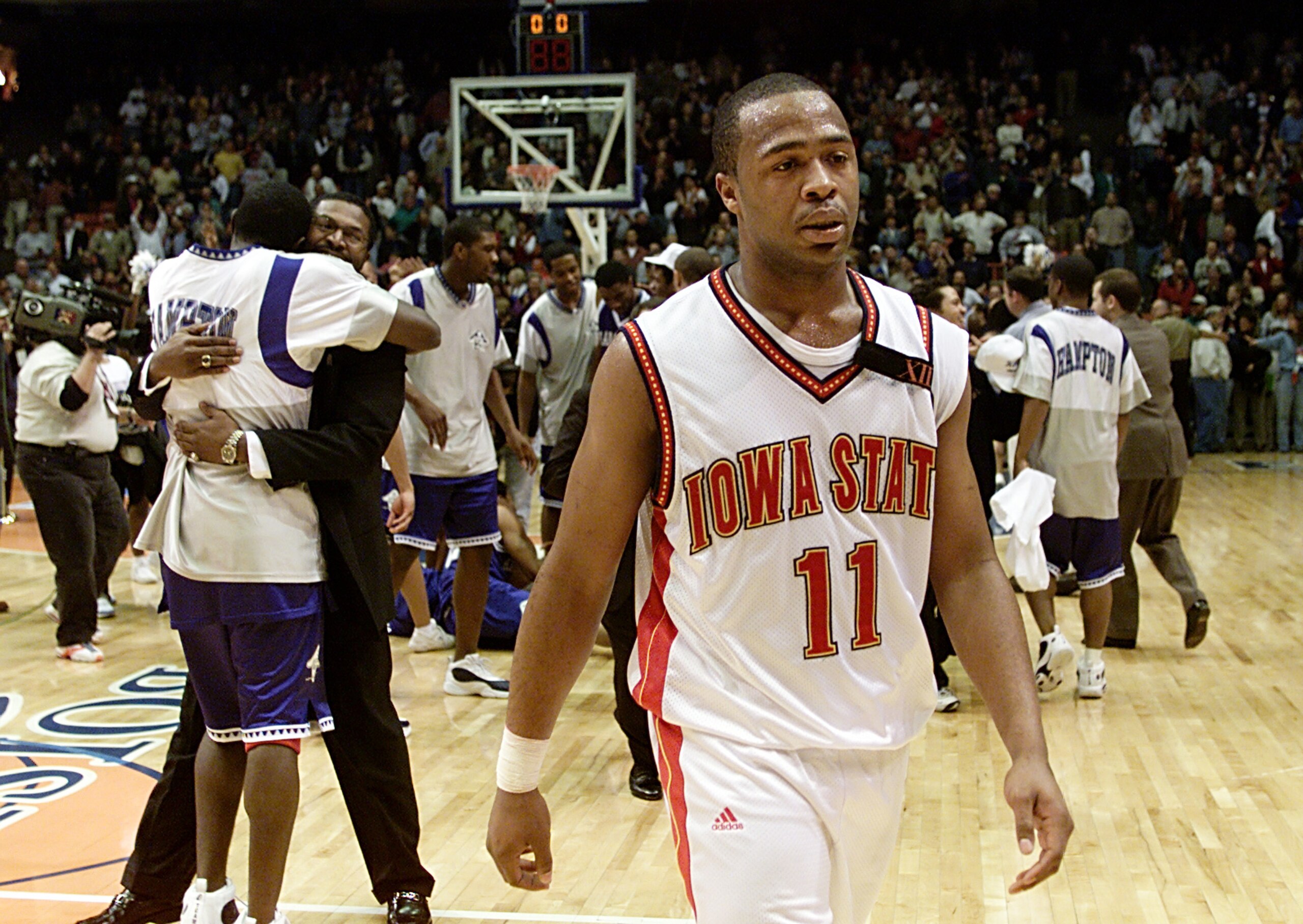 15 Mar 2001: Jamaal Tinsley #11 of the Iowa State Cyclones walks off the court after the Hampton Pirates won 58-57 during the first round of the NCAA Tournament at the Boise State University Pavilion in Boise, Idaho. <DIGITAL IMAGE> Mandatory Credit: 15 Mar 2001: Jamaal Tinsley #11 of the Iowa State Cyclones walks off the court after the Hampton Pirates won 58-57 during the first round of the NCAA Tournament at the Boise State University Pavilion in Boise, Idaho. <DIGITAL IMAGE> Mandatory Credit: